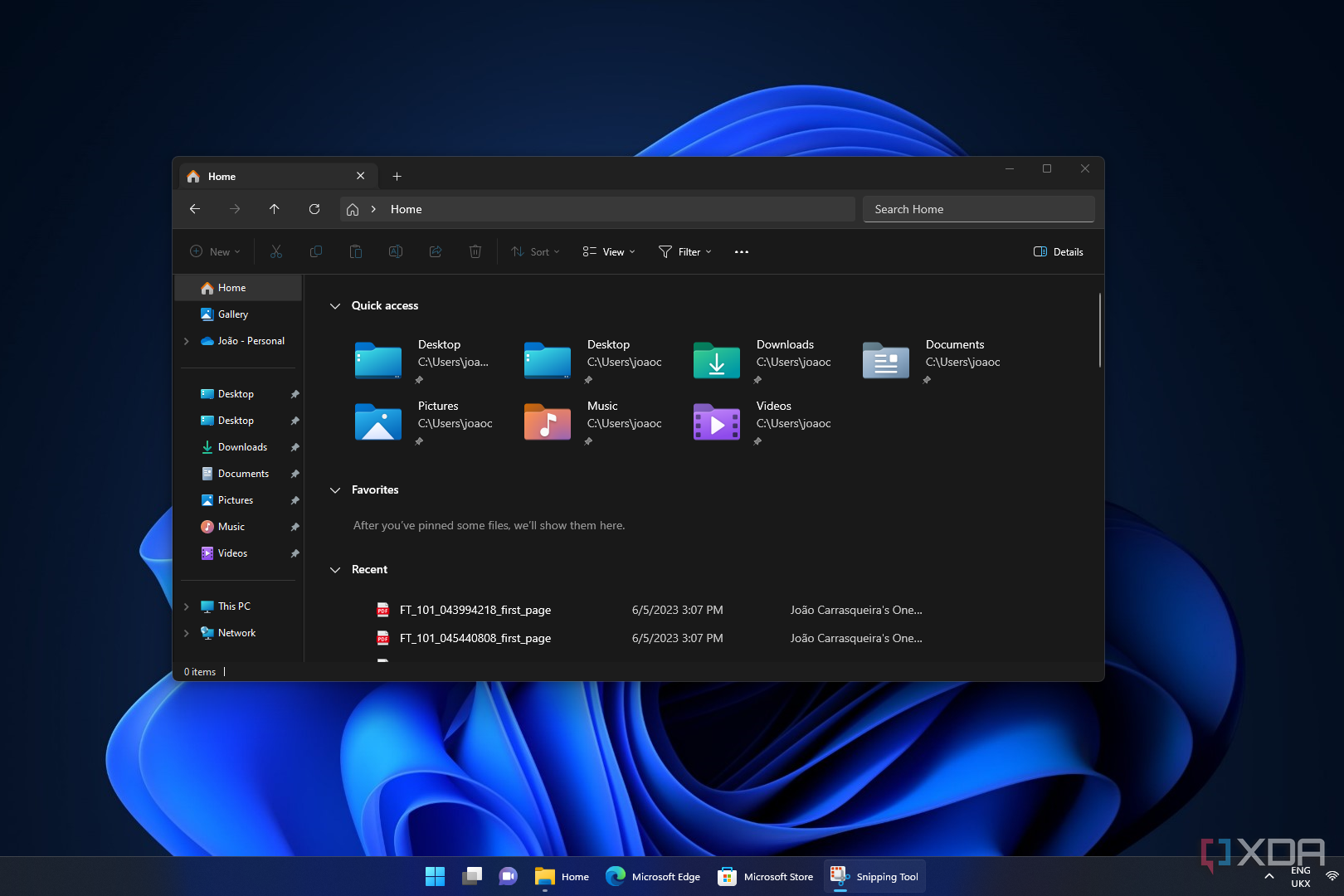 Screenshot of the new File Explorer open over the Windows 11 desktop in dark mode