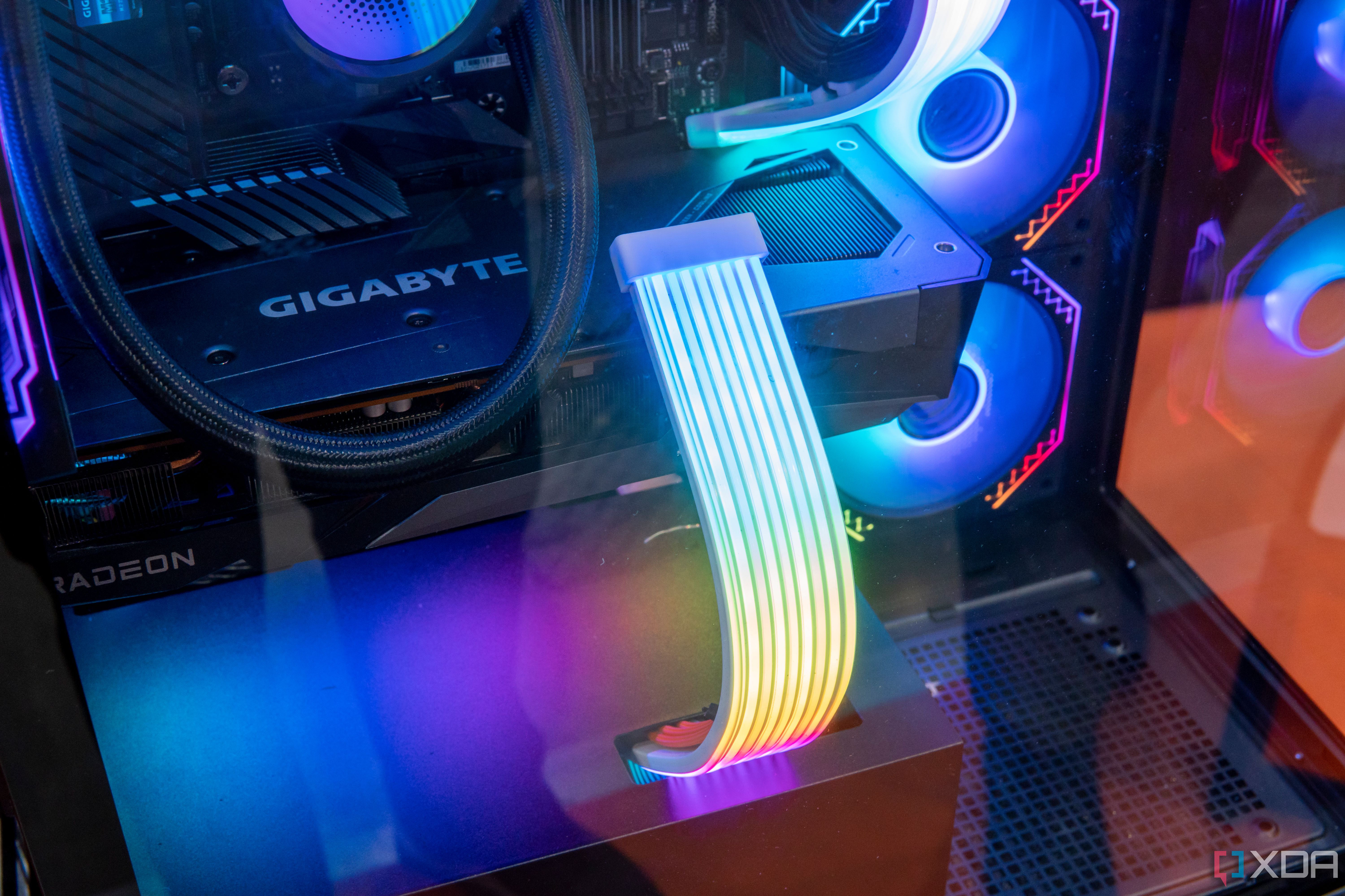 Close-up view of the Xigmatek Endorphin 9 showing RGB cables