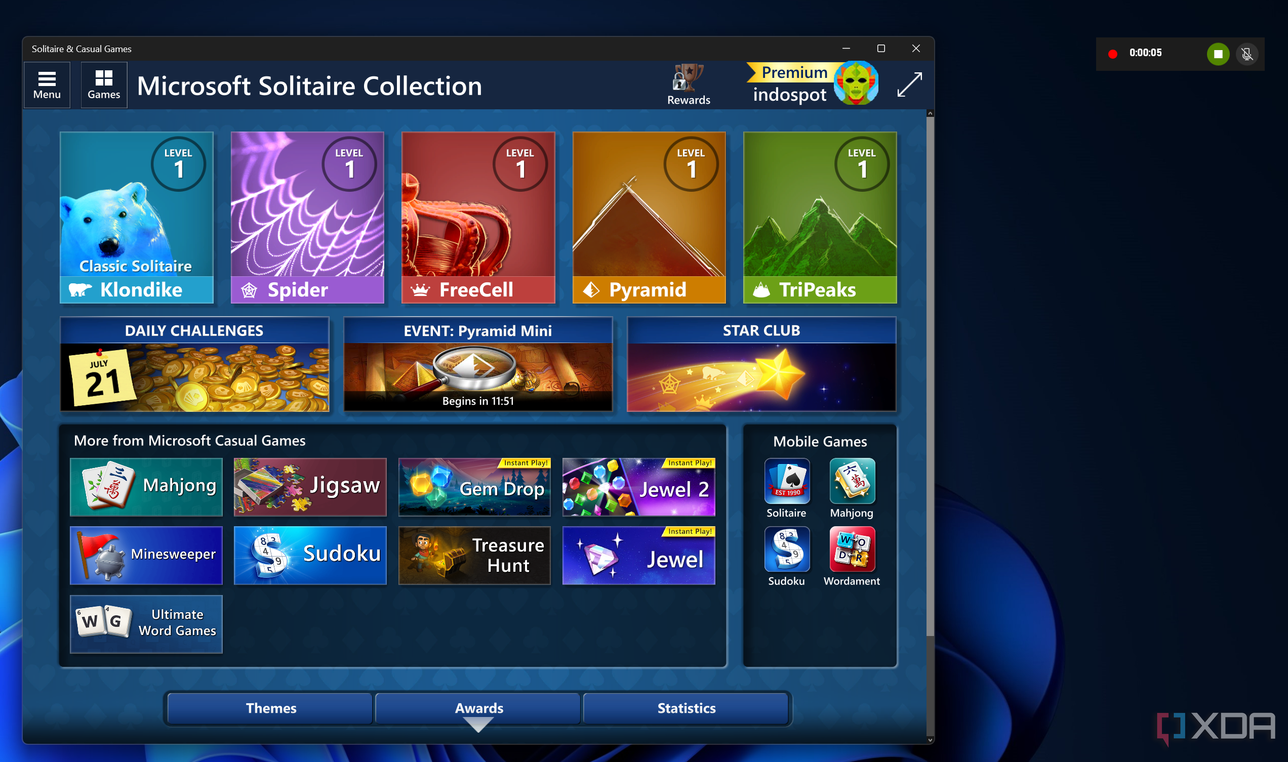 Screenshot of Microsoft Solitaire collection with a small overlay showing that the screen is being recorded. The overlay ahs a button to stop the recording and one to unmute the microphone