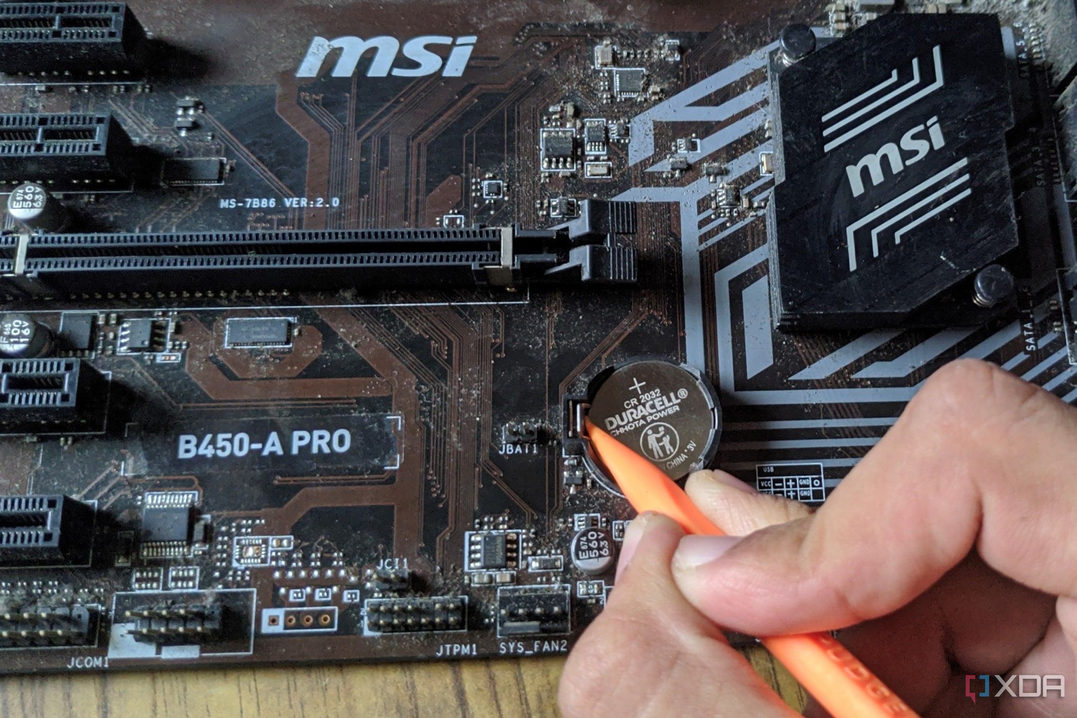 An image of a CMOS battery inside an MSI B450-A Pro motherboard