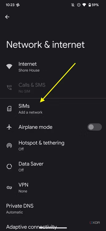 Screenshot of the Network & internet settings on the Pixel 7 Pro with an arrow pointing at the SIMs option.