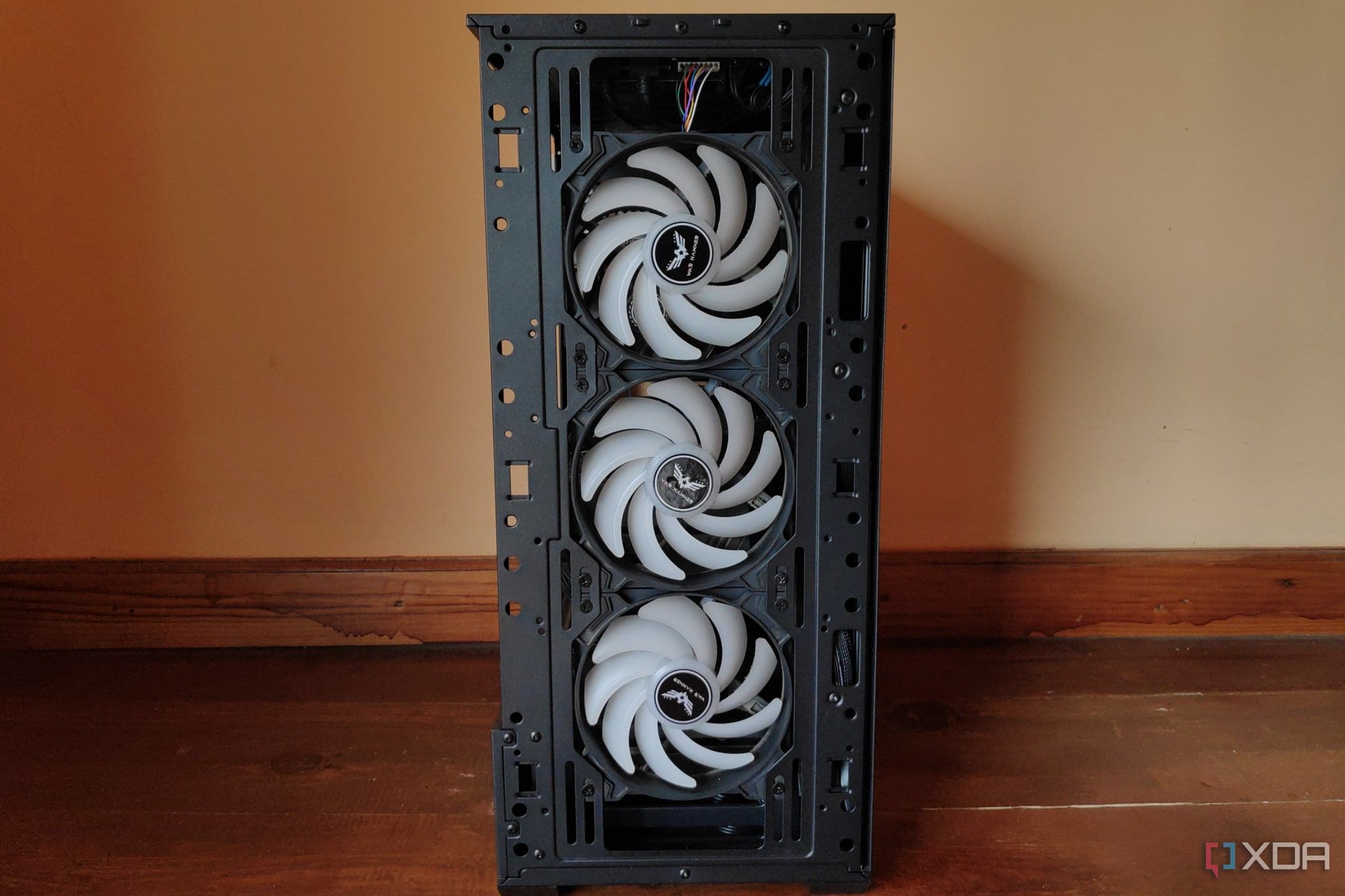 Three War Hammer Kratos fans inside an MSI Forge 110R case.