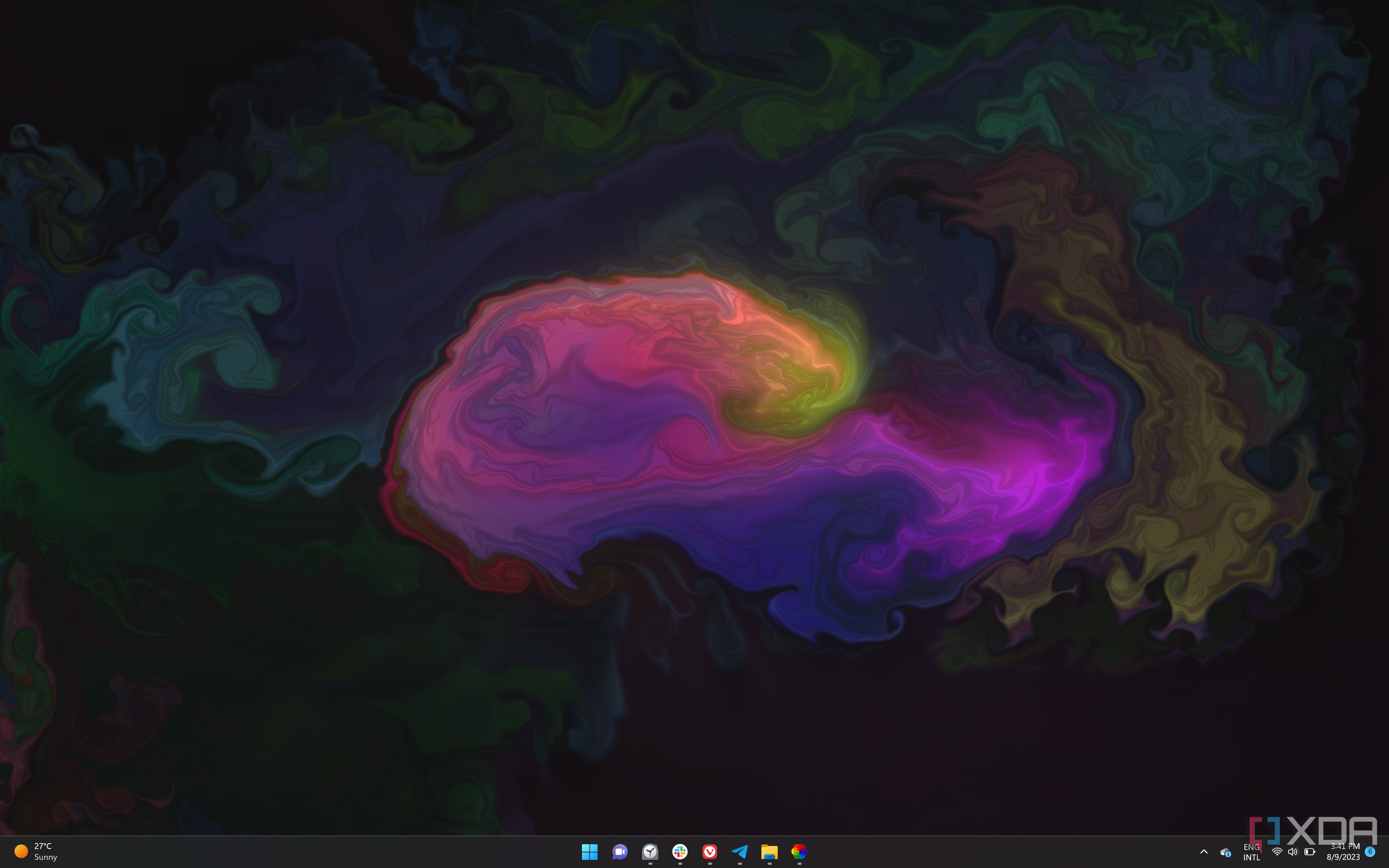 Screenshot of a Windows 11 desktop displaying a still frame of an animated wallpaper that produces ink splats 