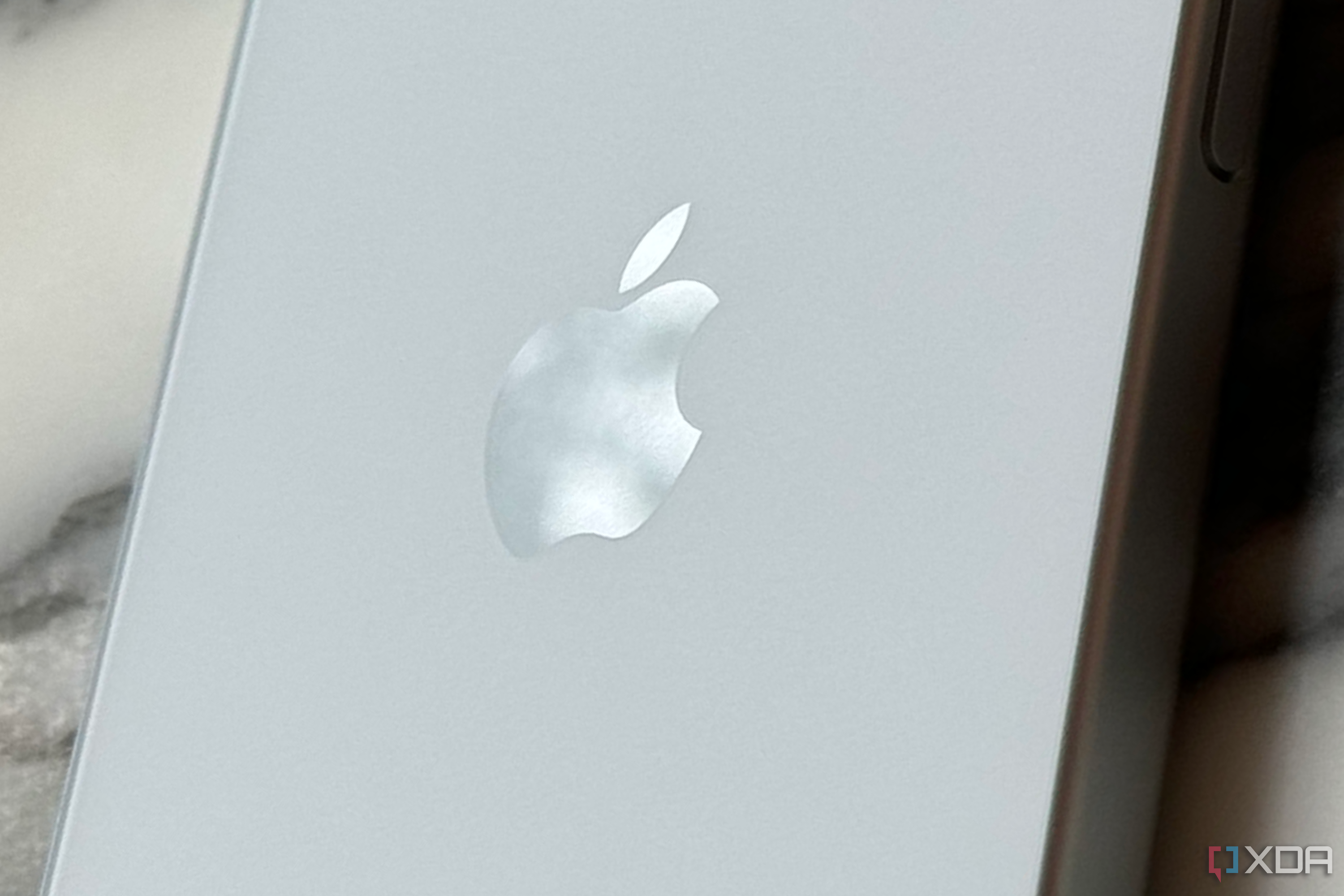 The frosted back glass of the iPhone 15.