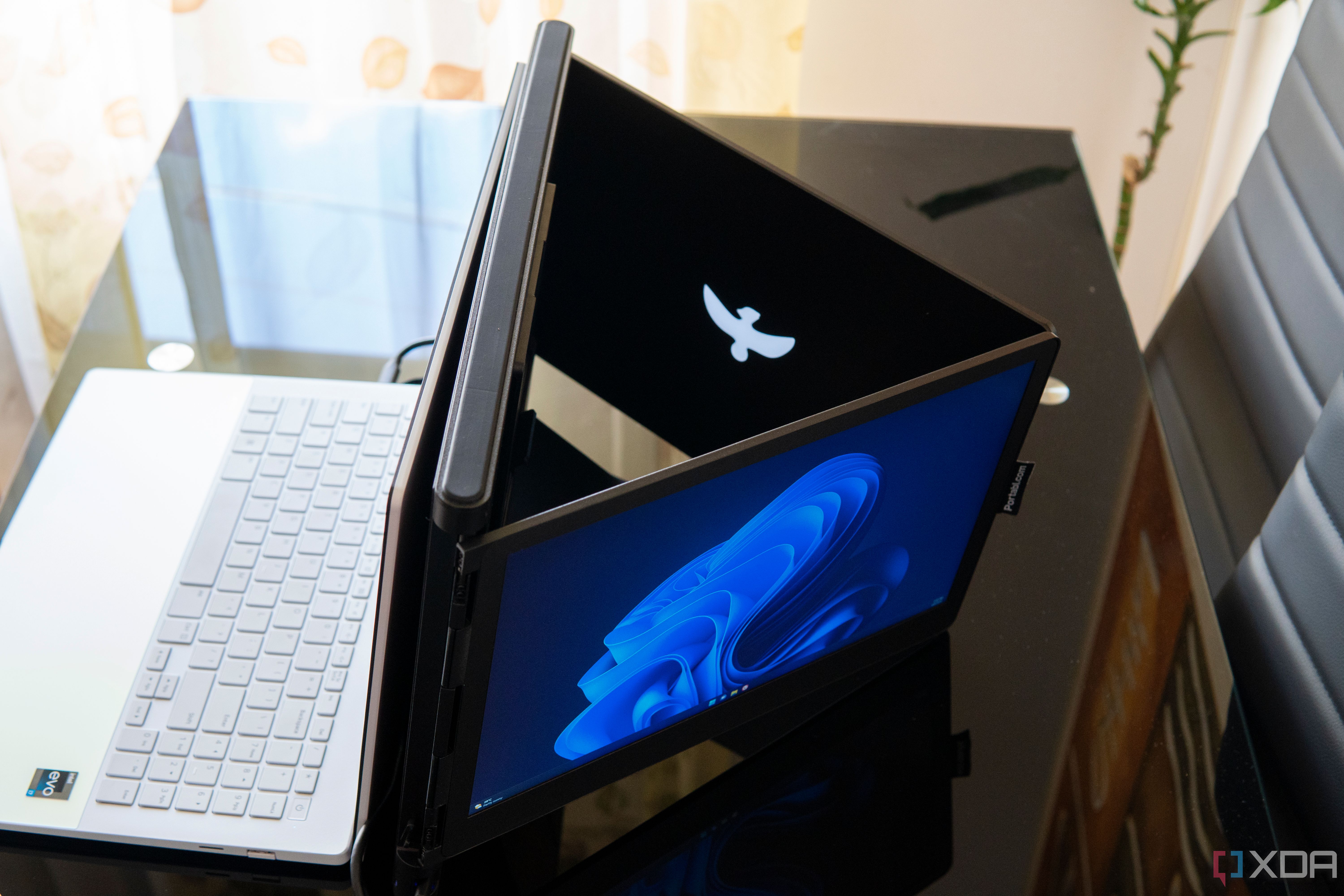 A Slide V2 used in triangle mode with the right screen facing the camera