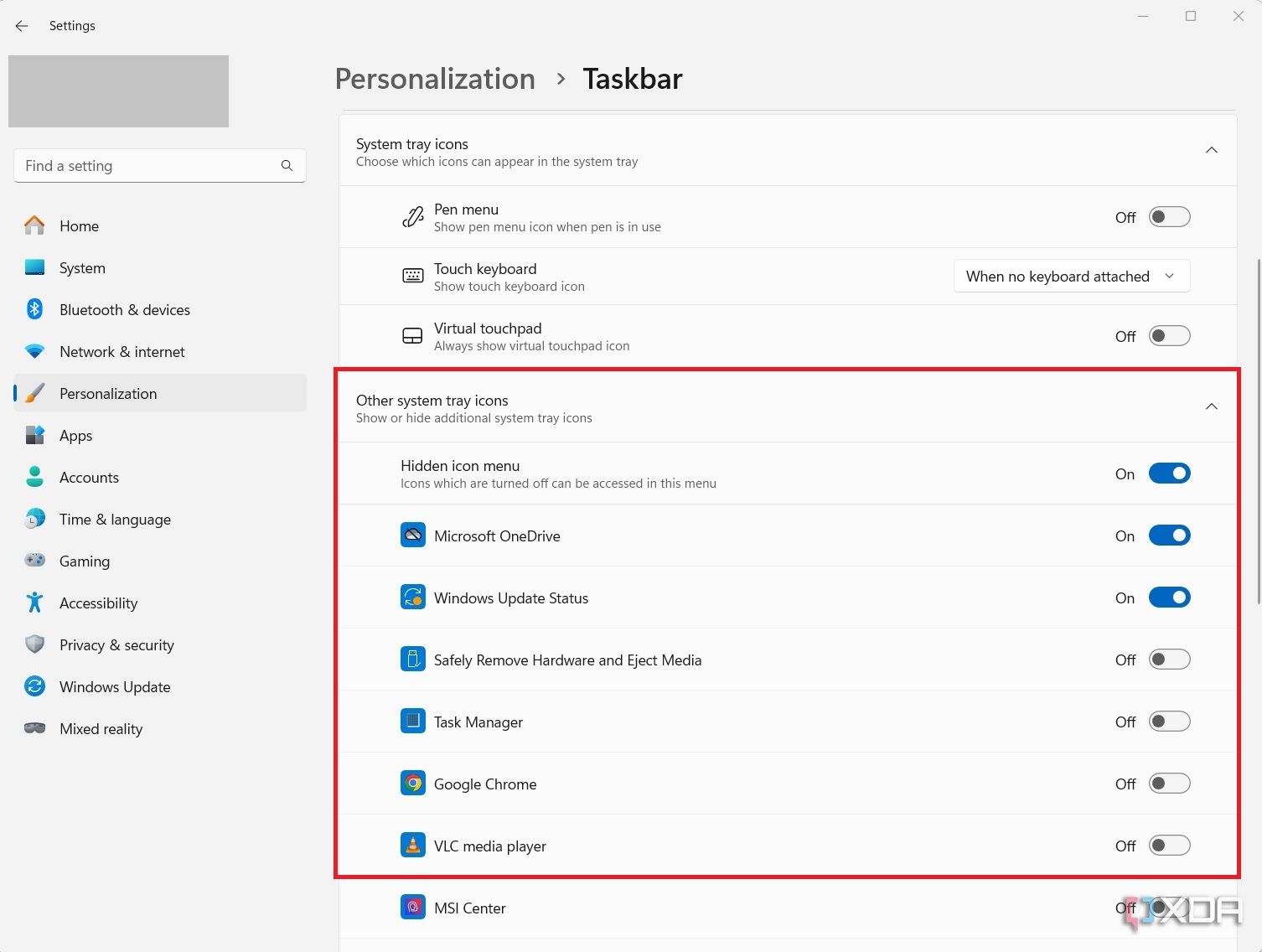 Screenshot of Windows 11 settings menu on the taskbar page