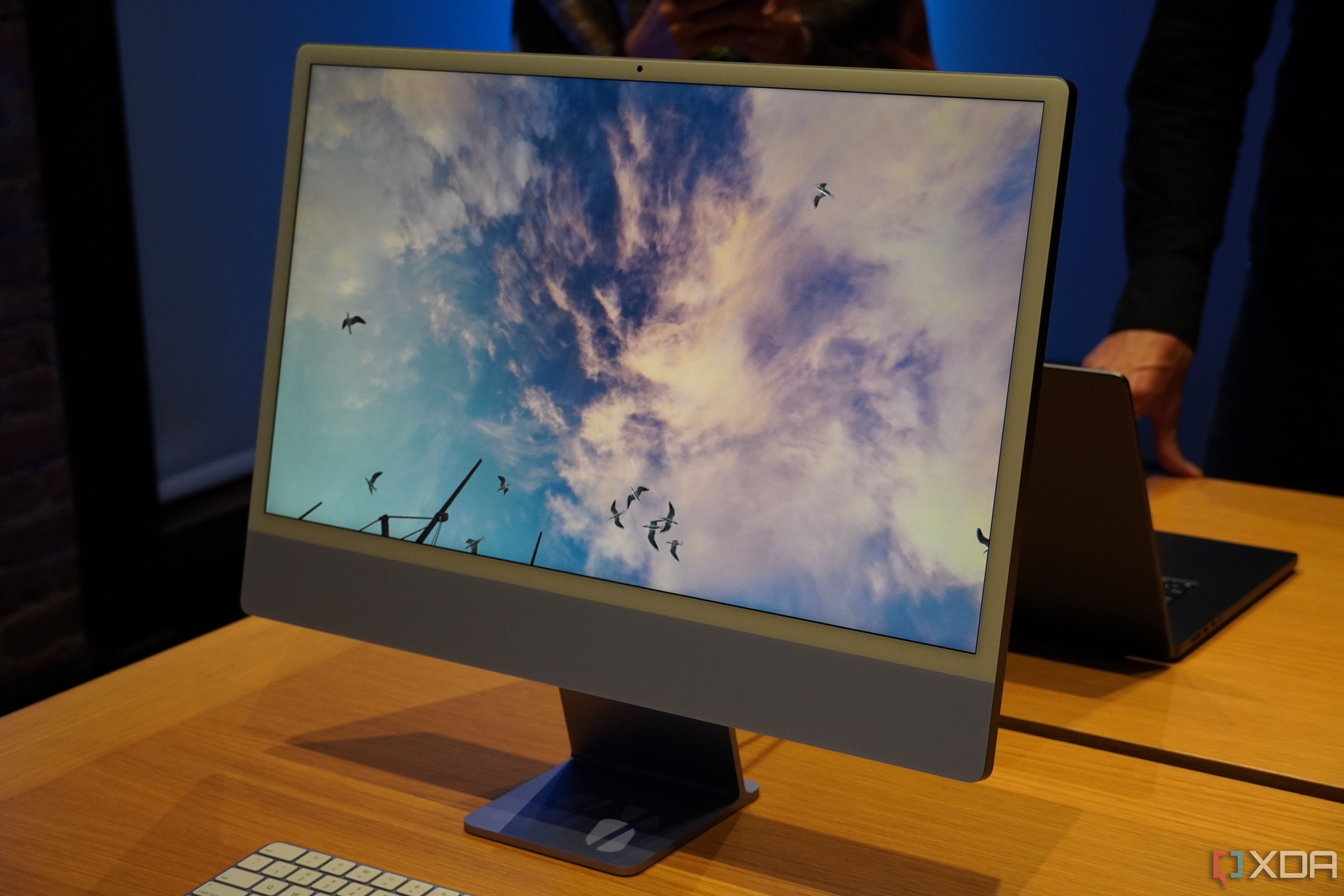 The 24-inch iMac is playing a game in full screen.