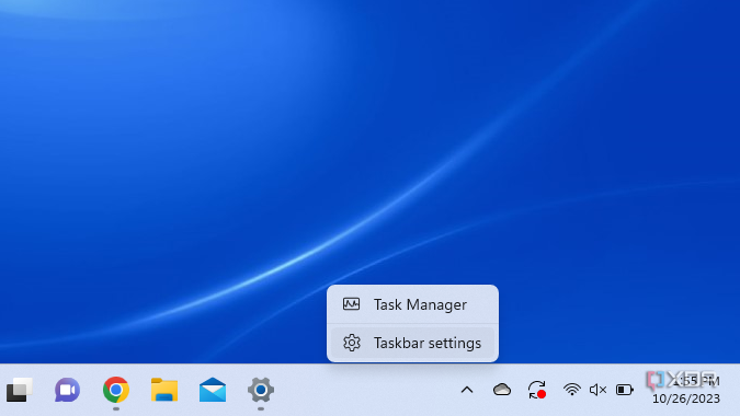Windows 11 taskbar with dropdown menu open