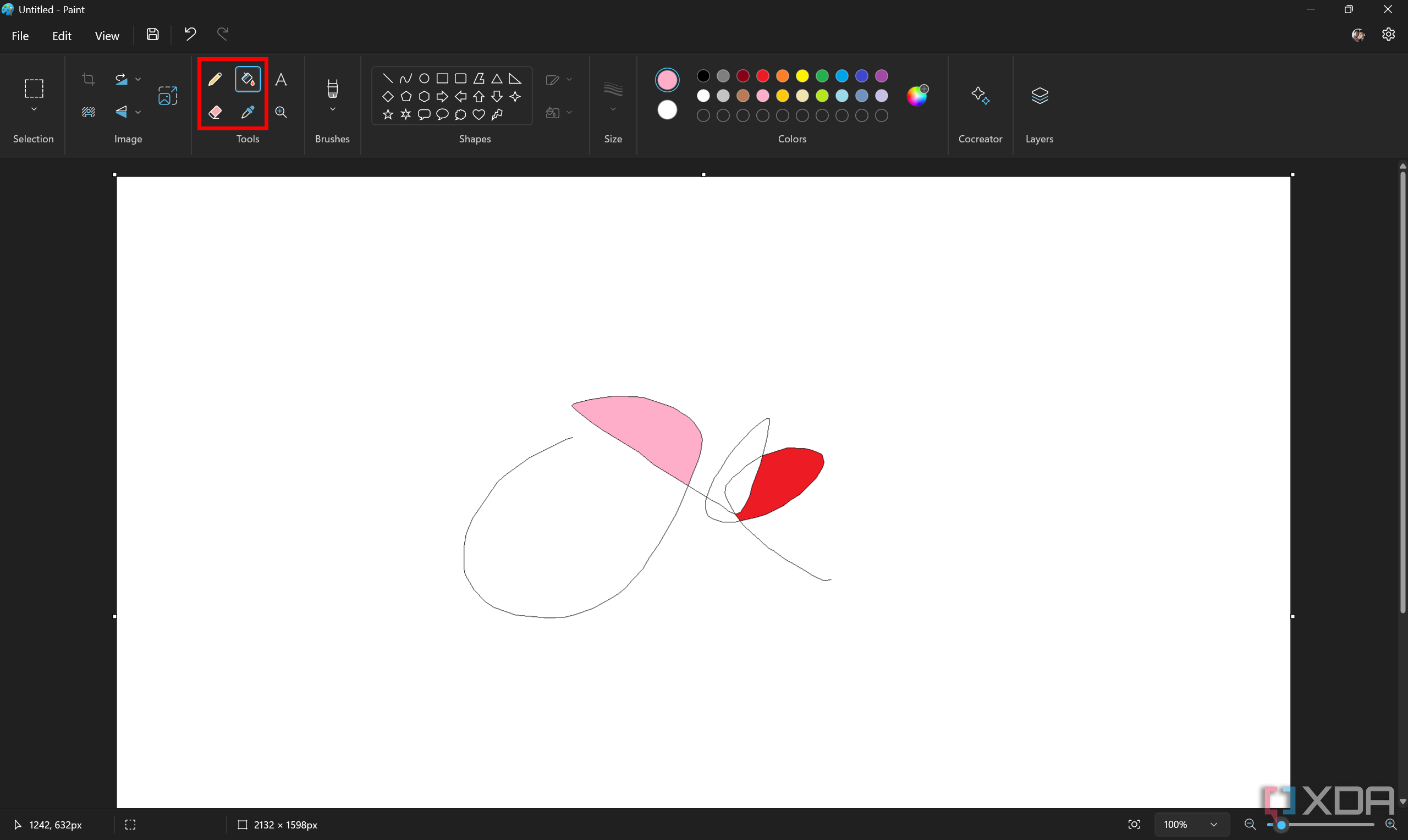Screenshot of Paint with a crude drawing made using the Pencil and Fill tools, which are highlighted on the toolbar