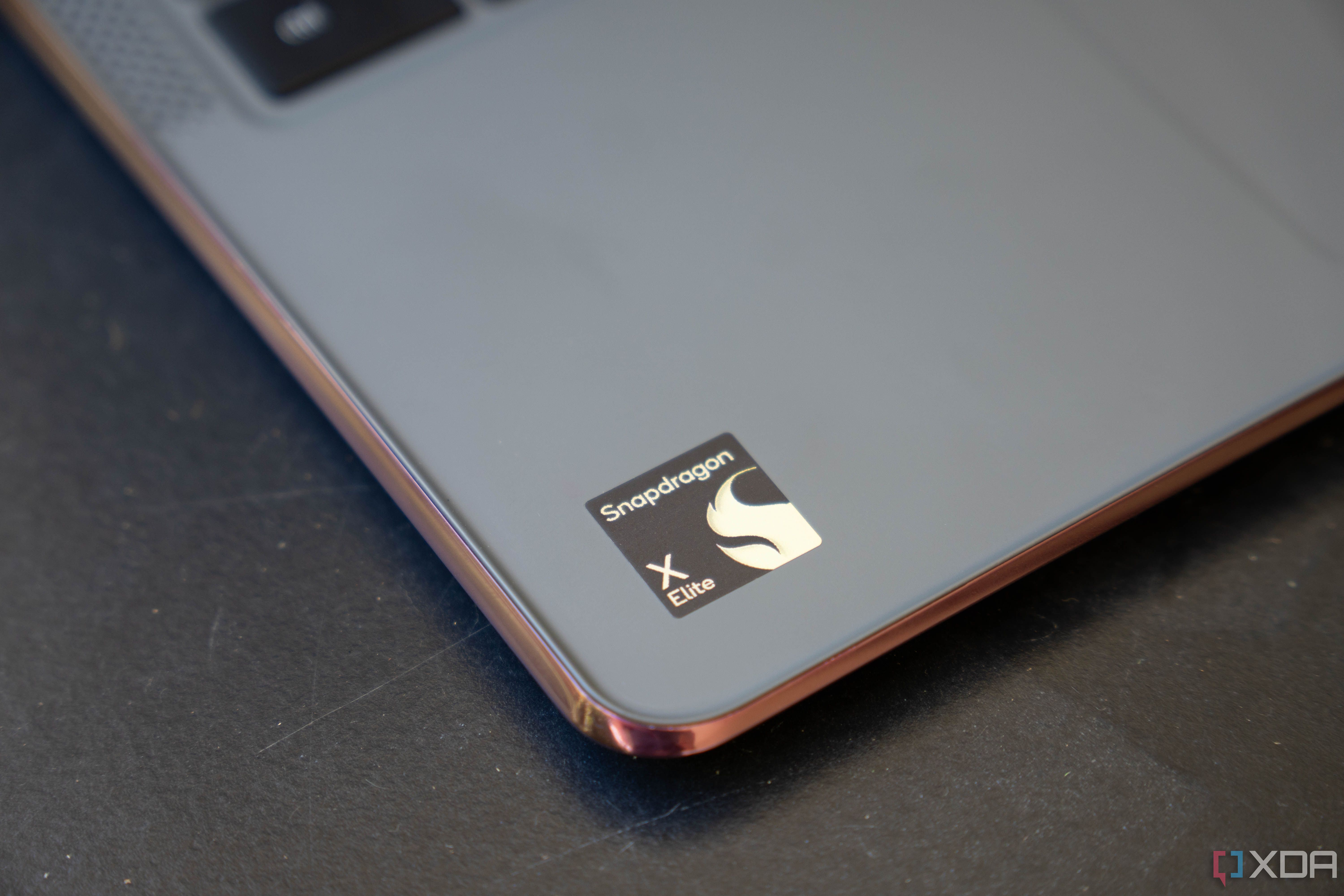 The Snapdragon X Elite badge on the palmrest of a laptop.