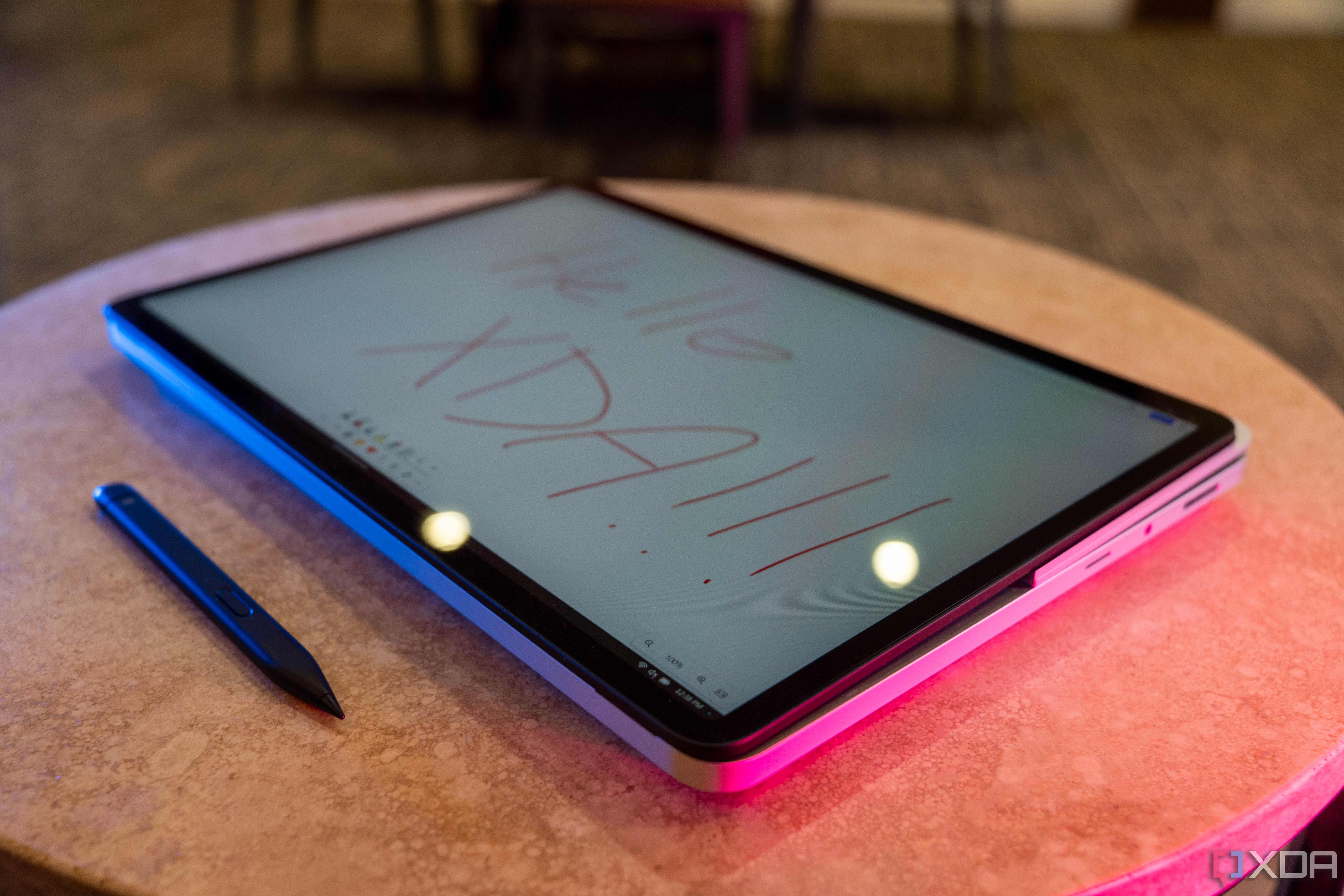 Hello XDA written on laptop in tablet orientation, with pen