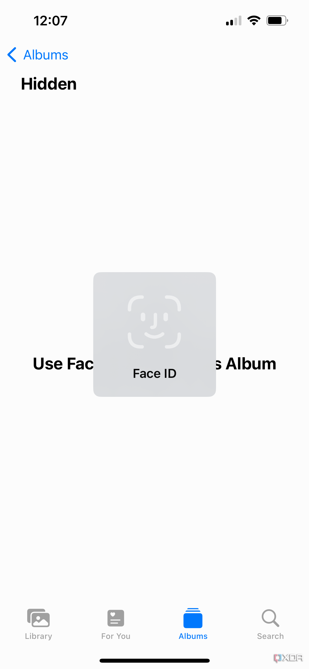 Скрытый iPhone альбом со всплывающим окном Face ID.