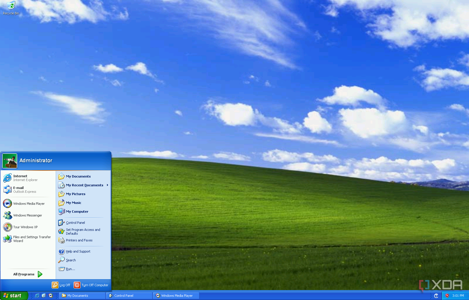 A screenshot of the Windows XP desktop with the Bliss wallpaper