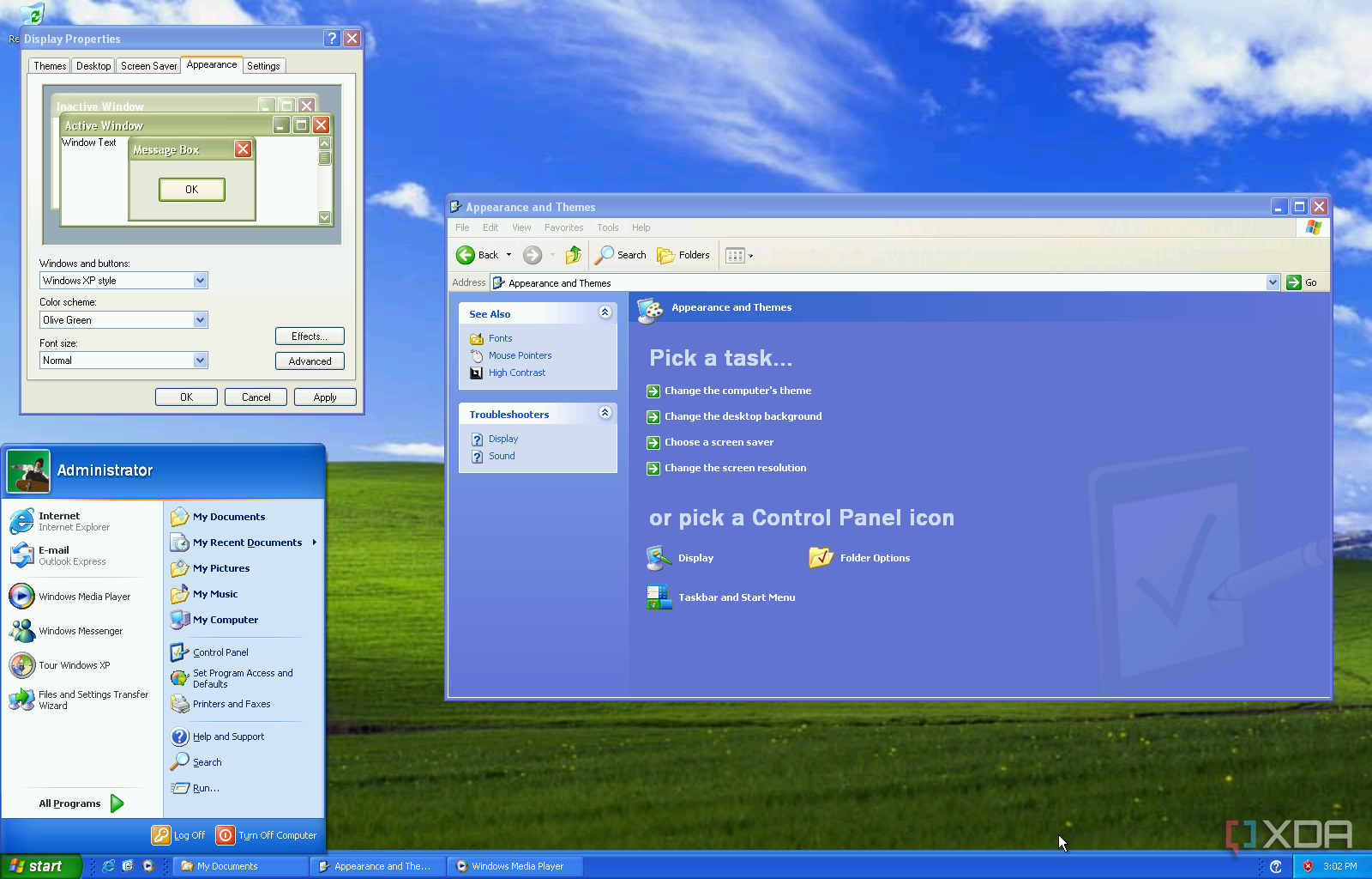Снимок экрана Windows XP с открытыми меню «Пуск», панелью управления и параметрами персонализации.