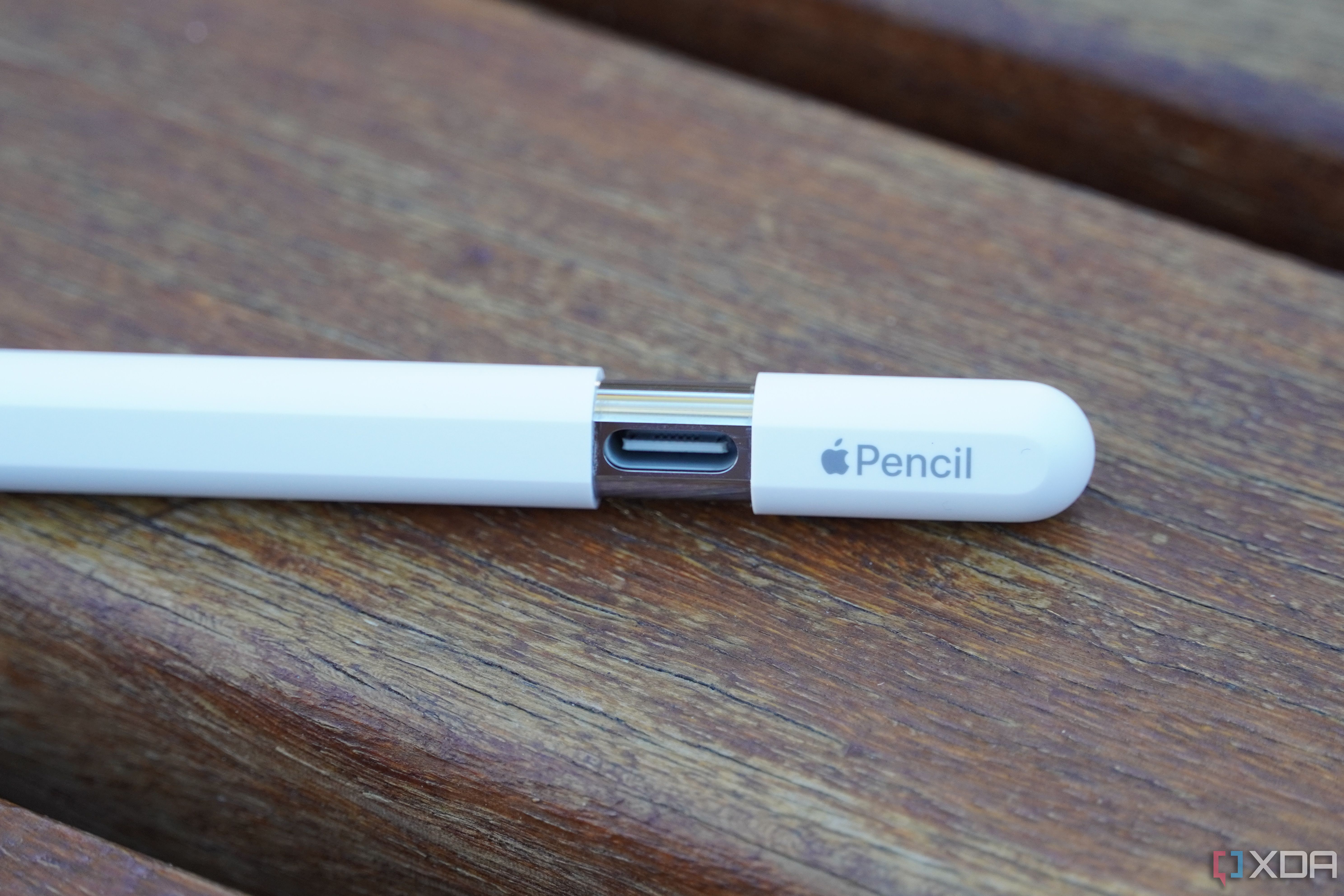 The Apple Pencil (USB-C) with the USB connector open. 