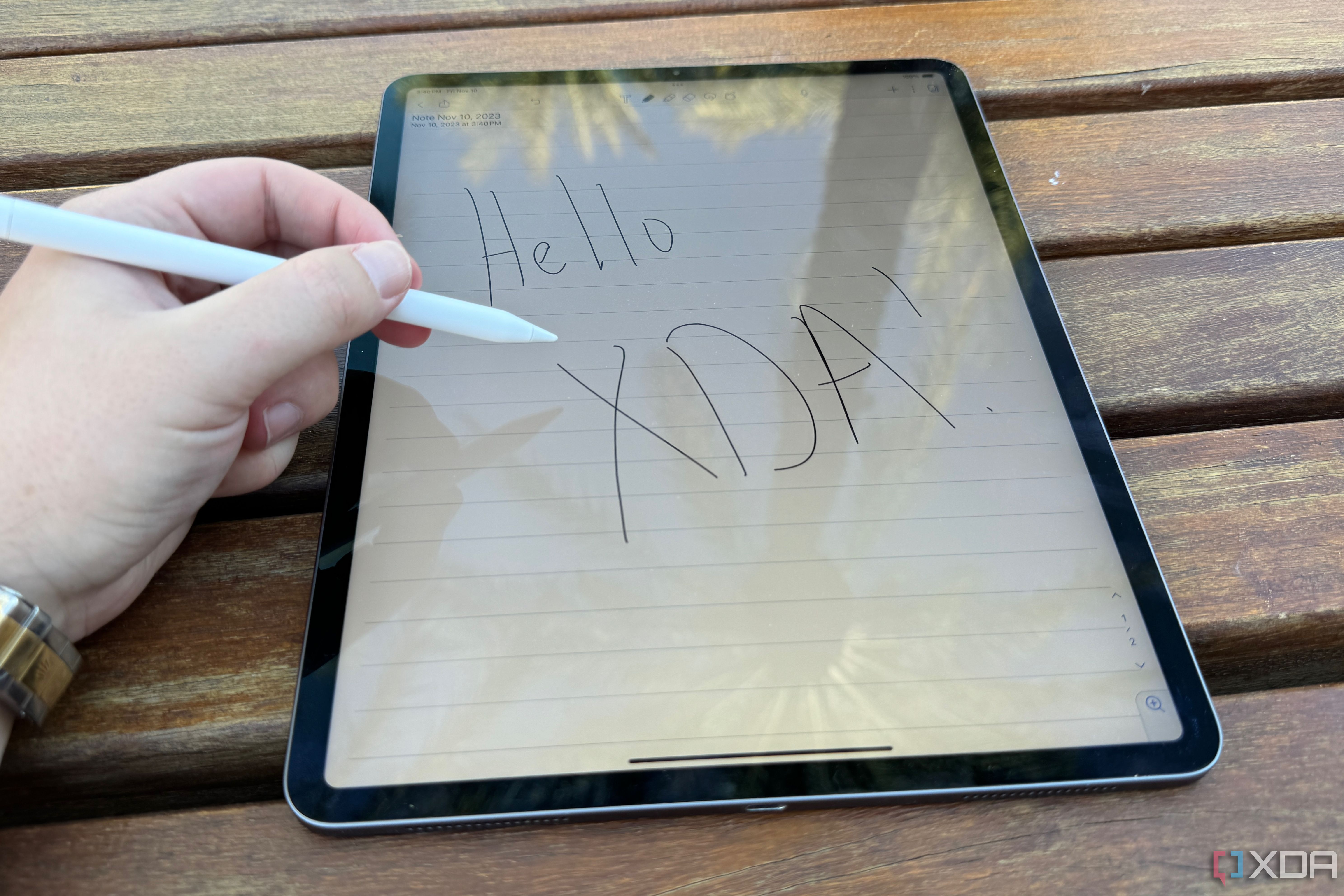 Hello XDA written on an iPad Pro with an Apple Pencil (USB-C).