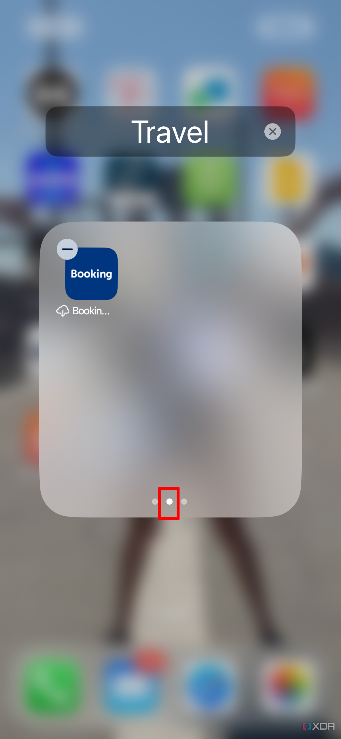 A Travel app folder on iPhone with an app being shown to appear on its own on the second page.