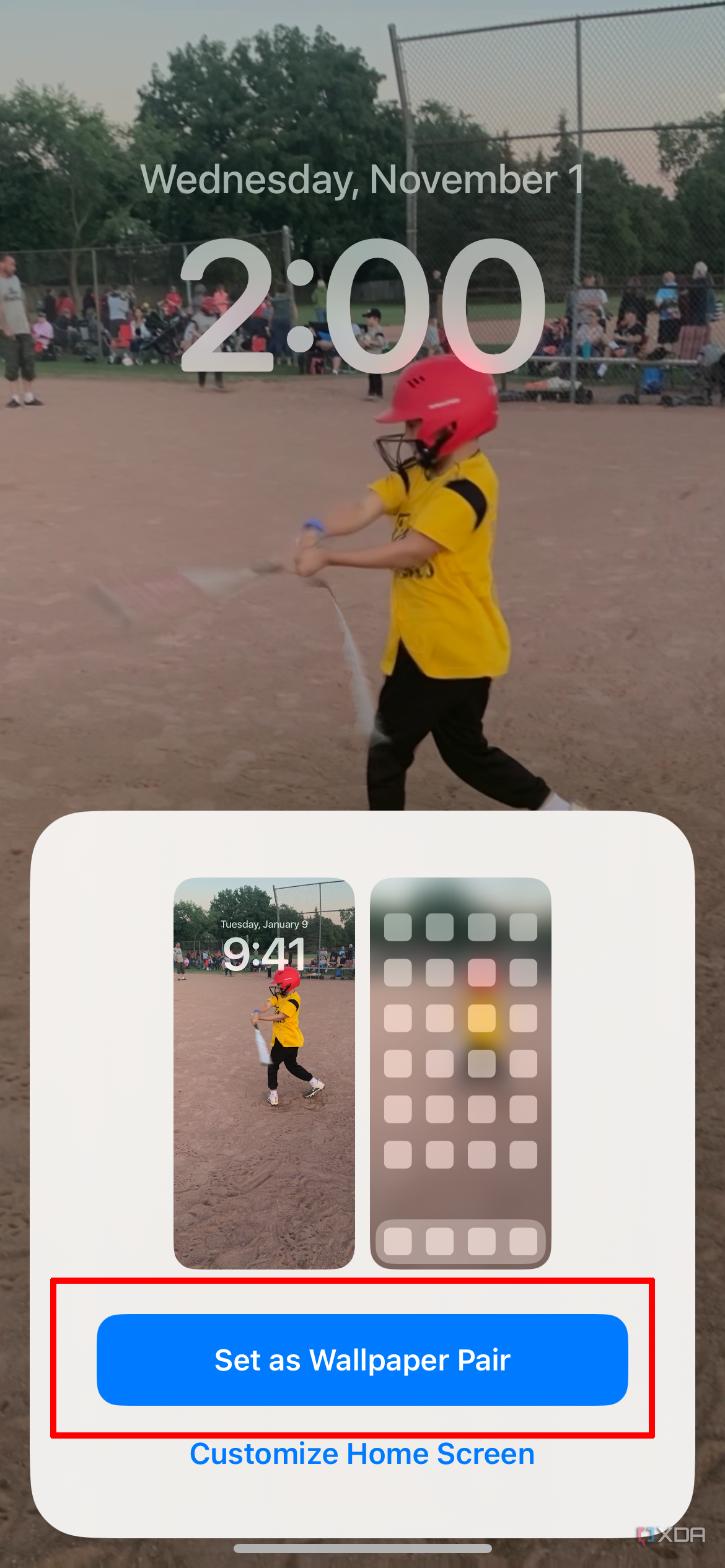 An iPhone lock screen with Set as Wallpaper Pair selected on screen.