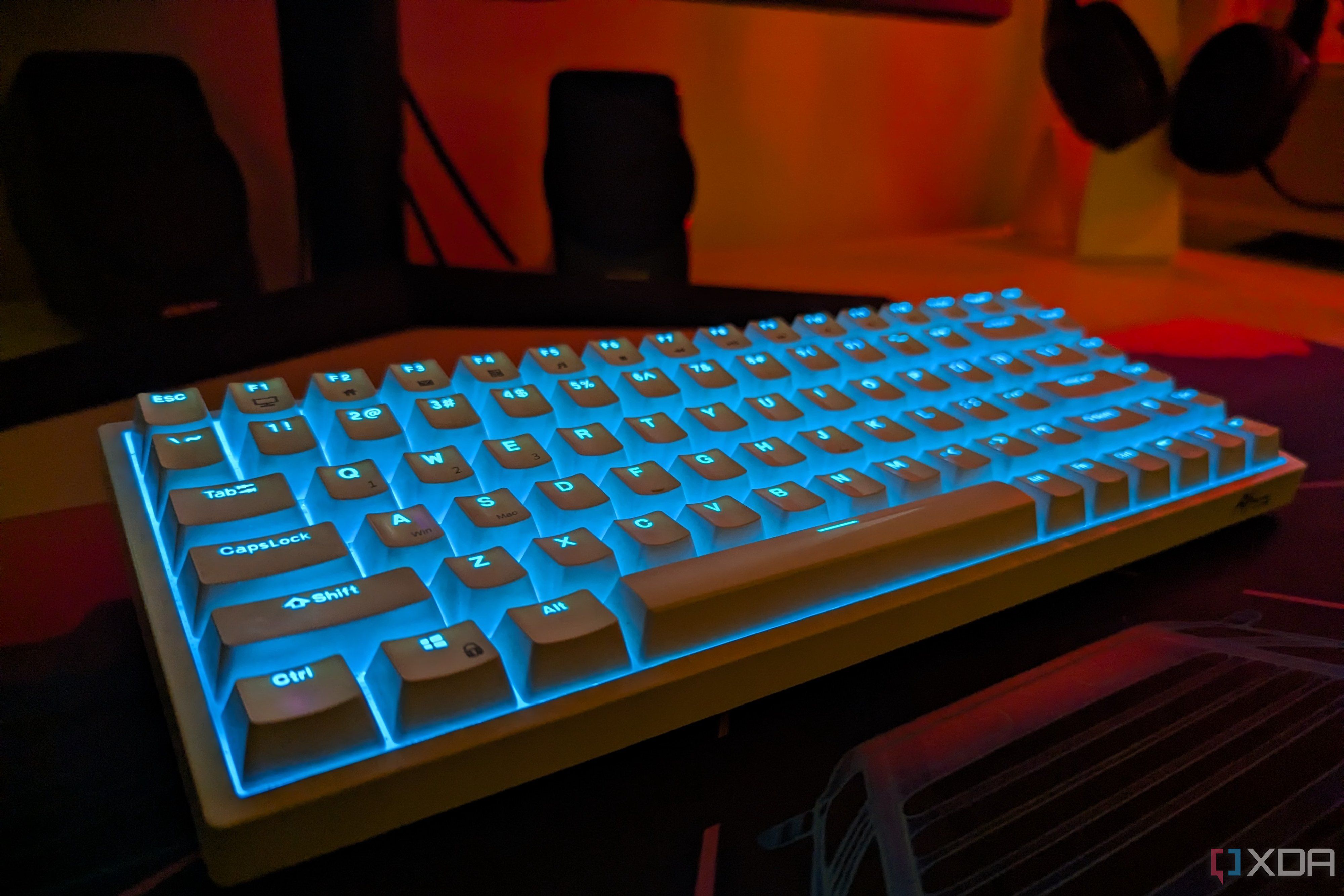 RK84 white keyboard with blue backlight on a desk