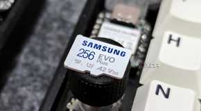An image showing a Samsung EVO Plus SDXC V30 card placed on a rotary knob of a keyboard.