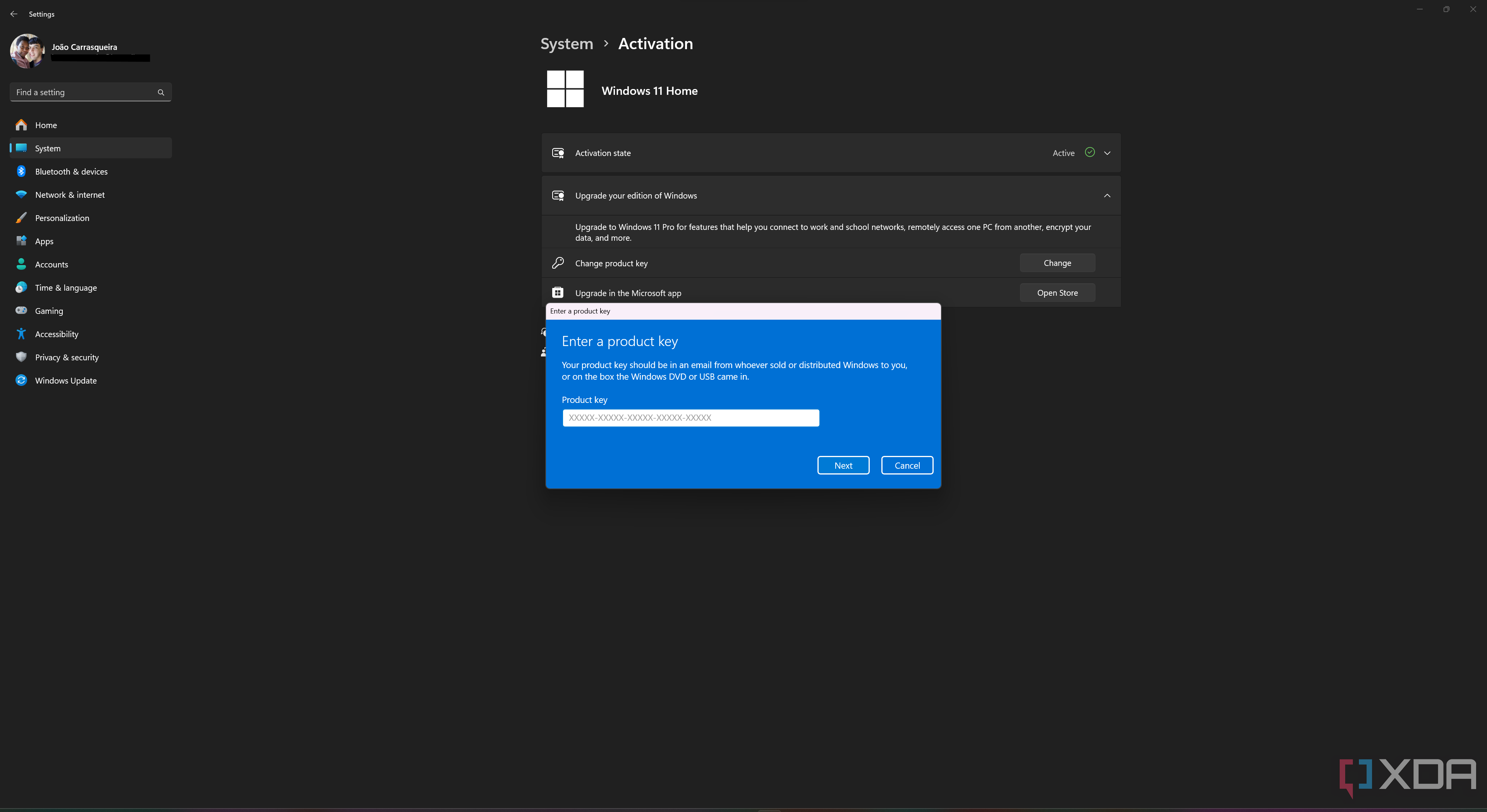Screenshot of the activation page in Windows 11 Settings with a prompt for the user to enter an activation key