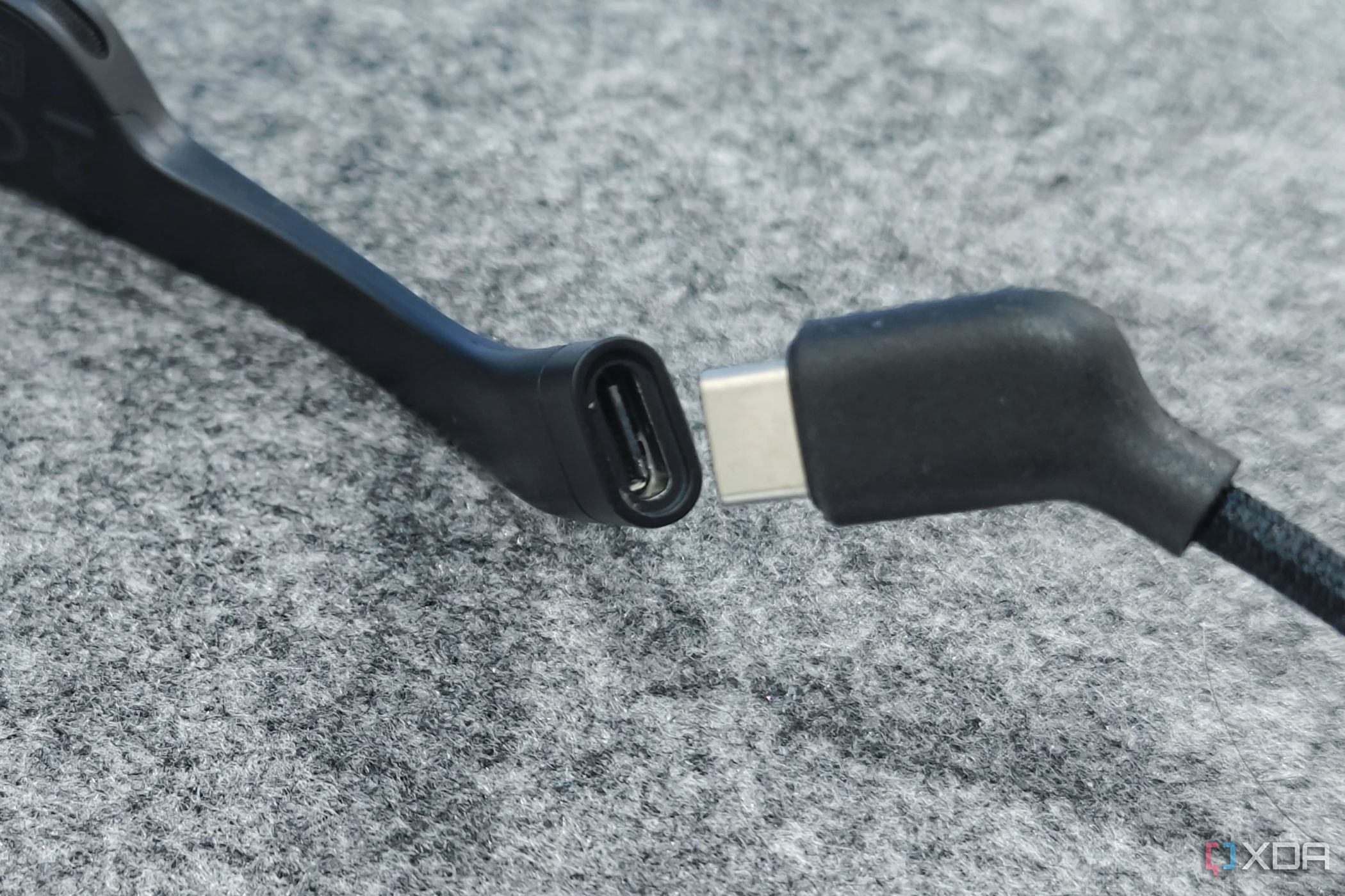 An image showing the XREAL Air 2's USB-C port next to an angled connector.