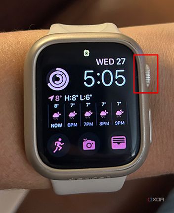 An Apple Watch on wrist with the Digital Crown selected.