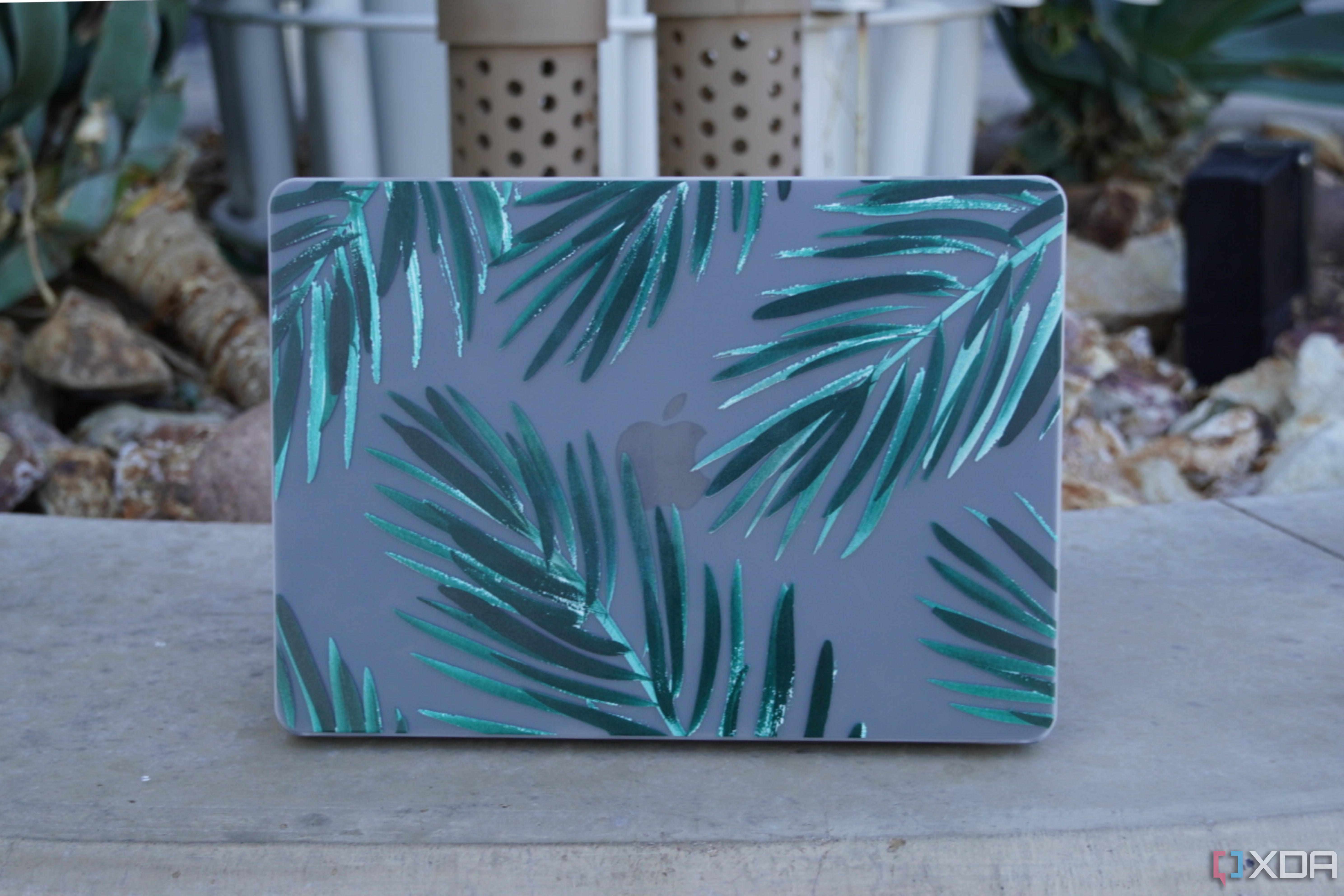 The Casetify Snap MacBook Case on a laptop with the lid open.
