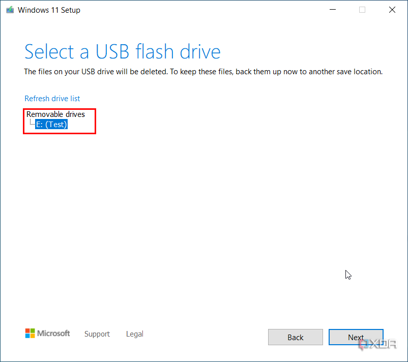 Screenshot of Windows 11 Media Creation Tool asking the user to choose a flash drive to use for installation.