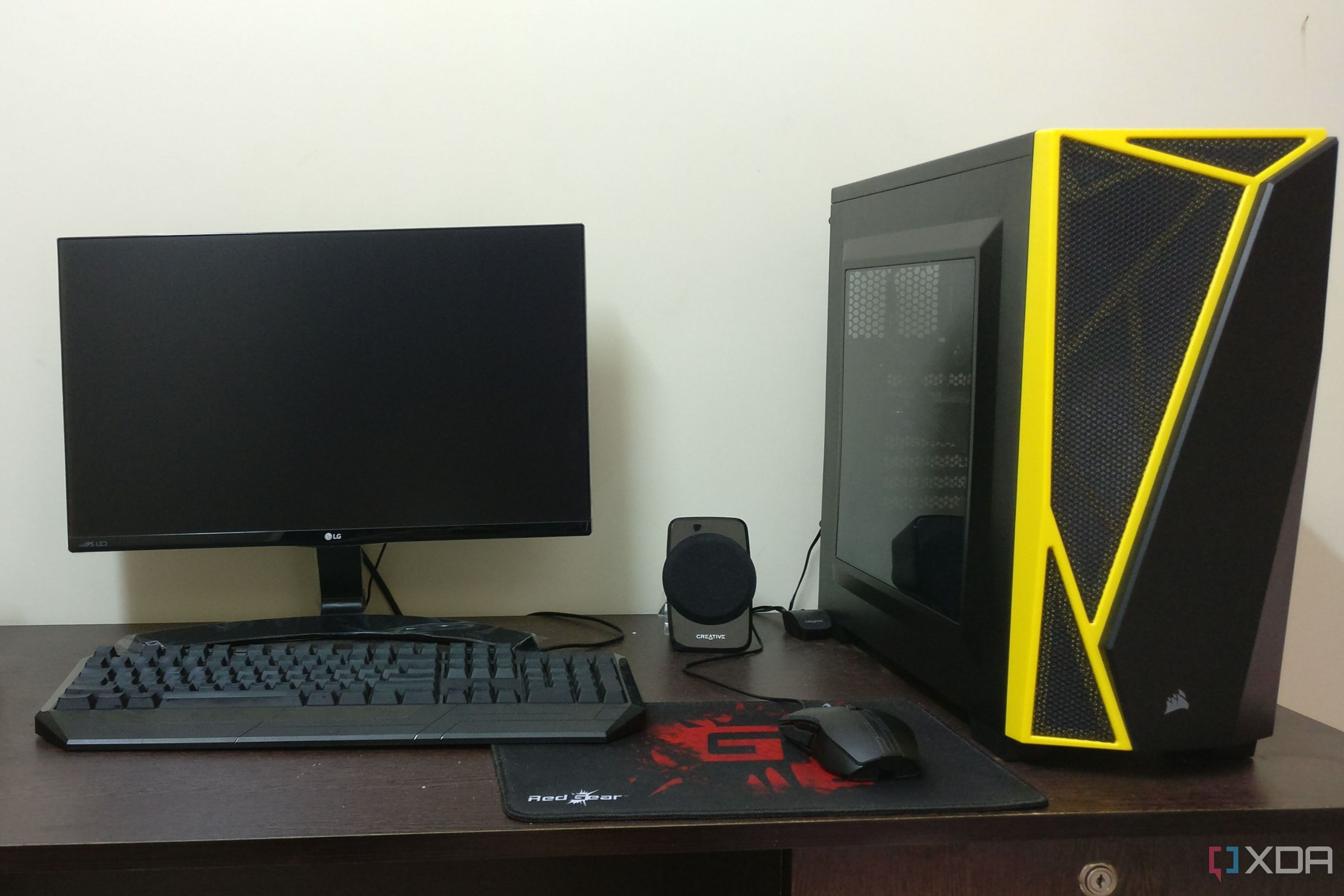 Black Gaming PC setup with monitor and keyboard mouse