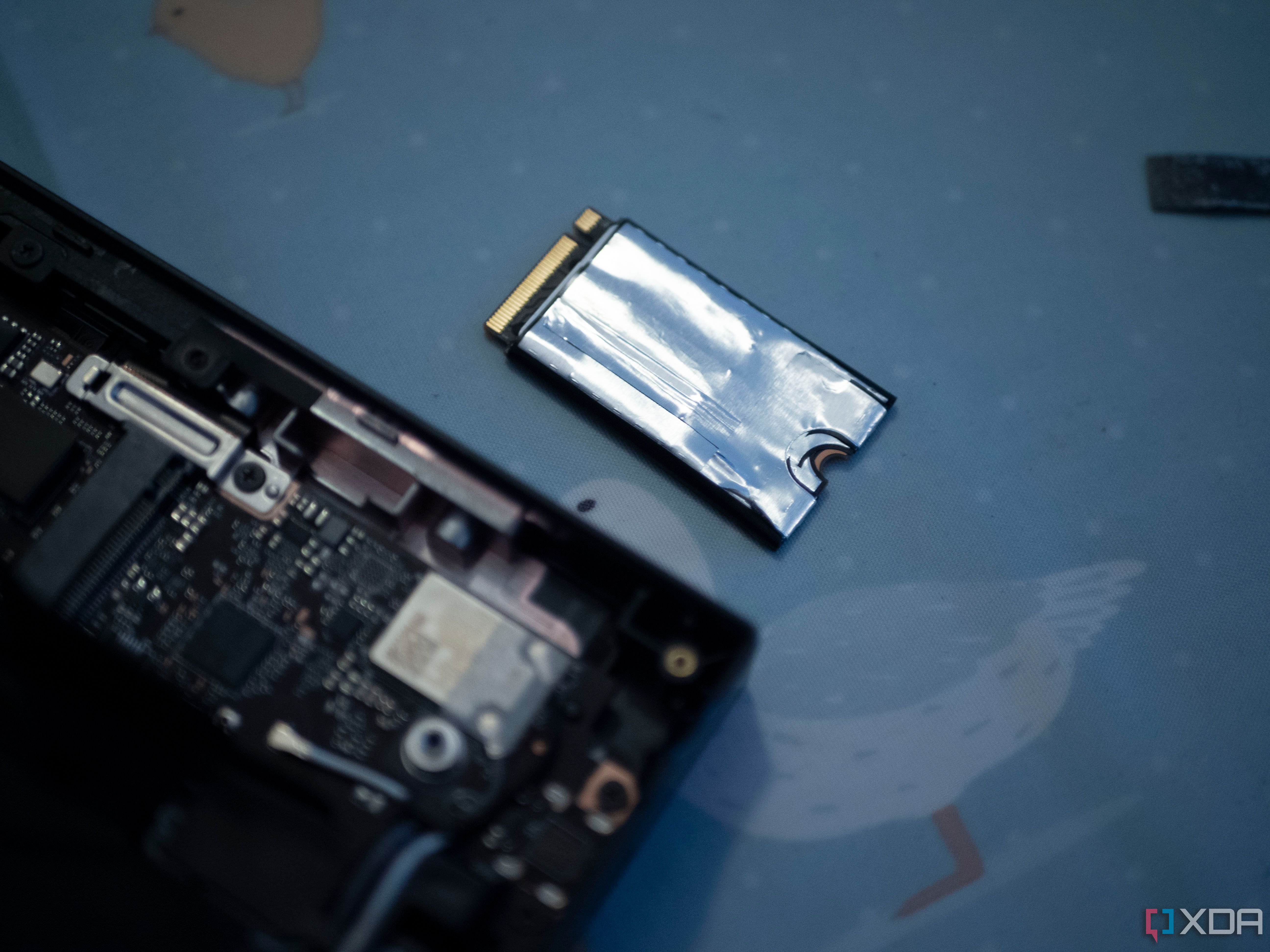 Lenovo Legion Go SSD removed from device with foil over it