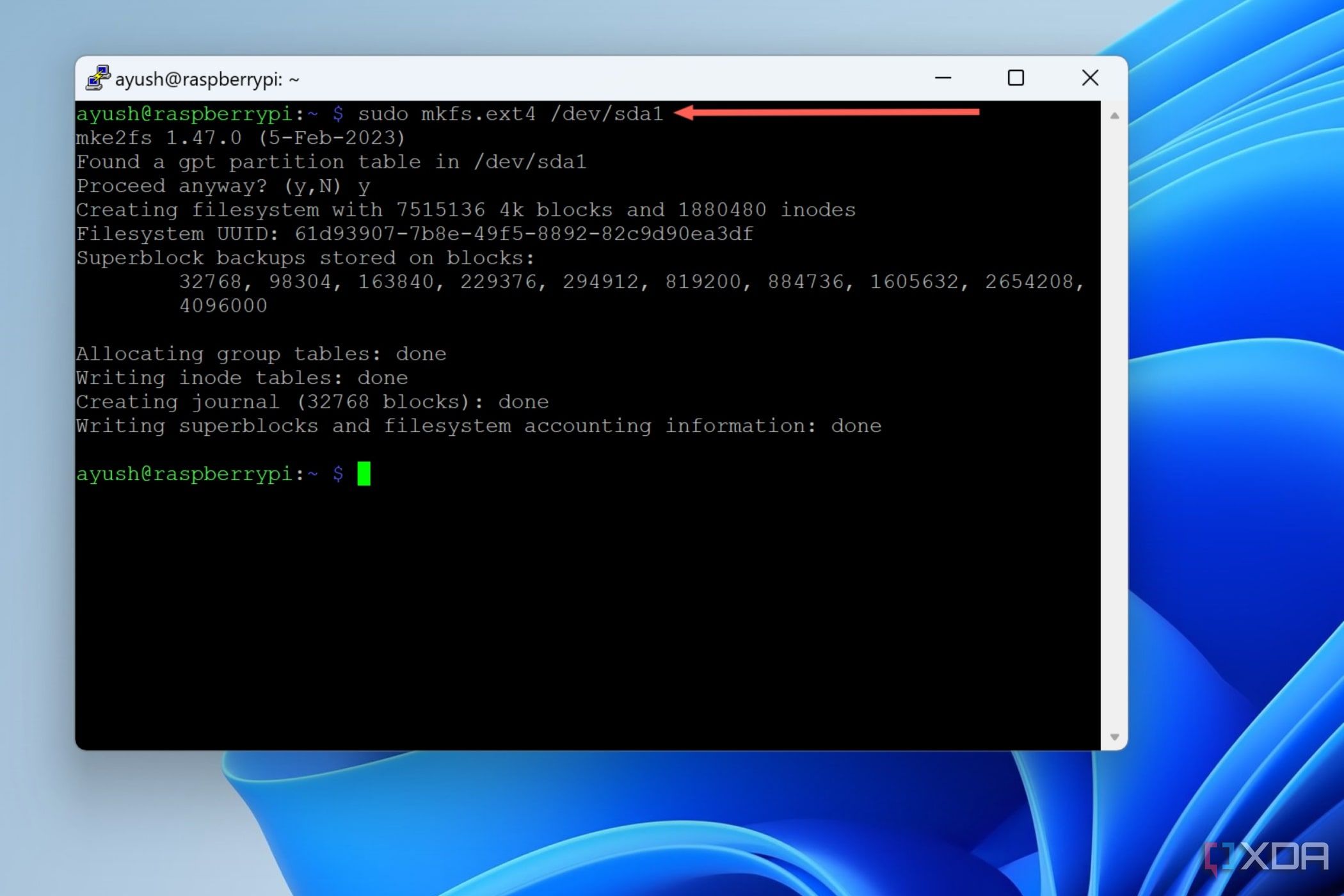 Una captura de pantalla de PuTTY con el comando mkfs.ext4 resaltado