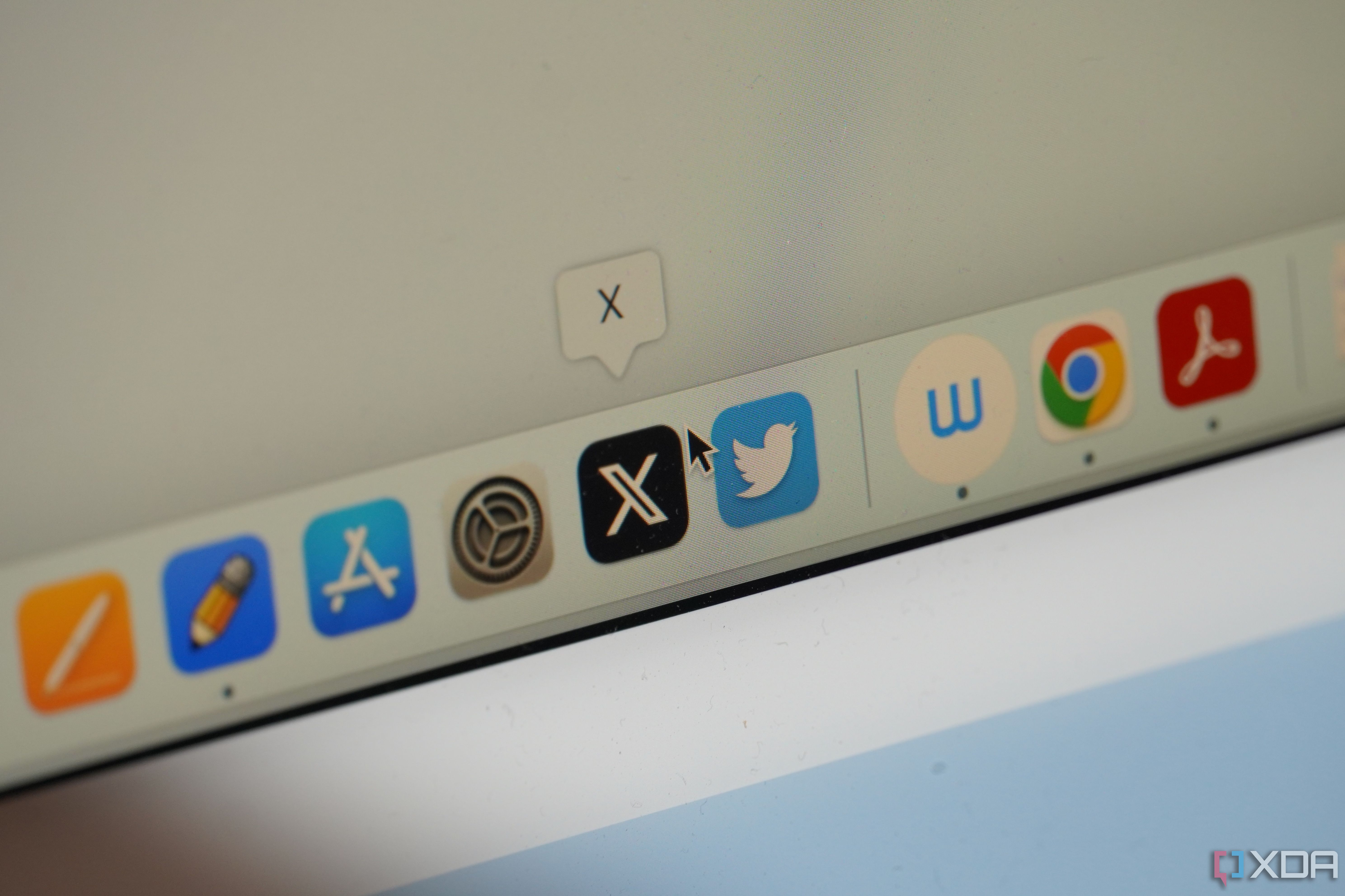 The Twitter and X icons in the macOS Dock.