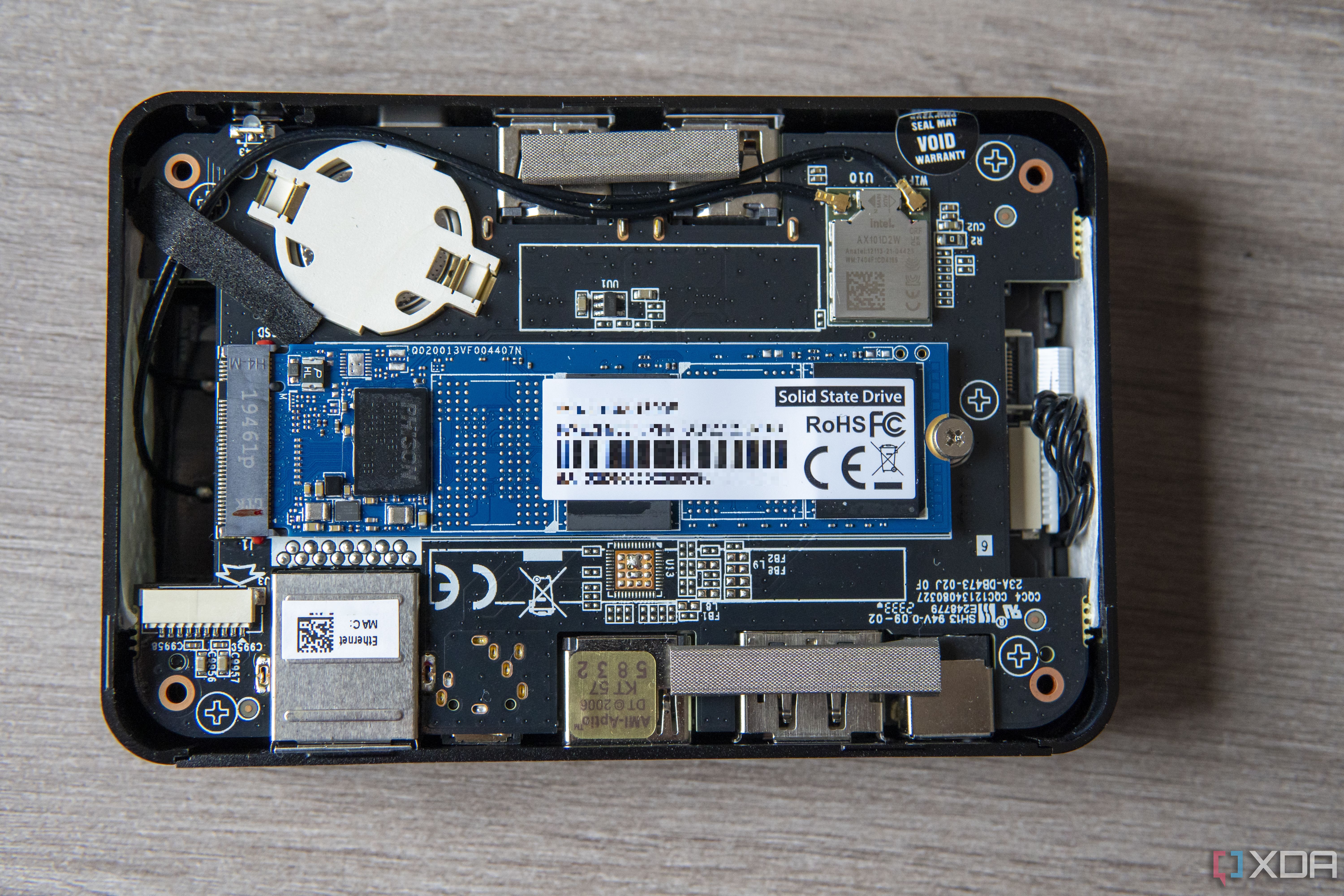 Overhead view of an opened Zotac Zbox Pico PI430AJ showing the SSD and various components