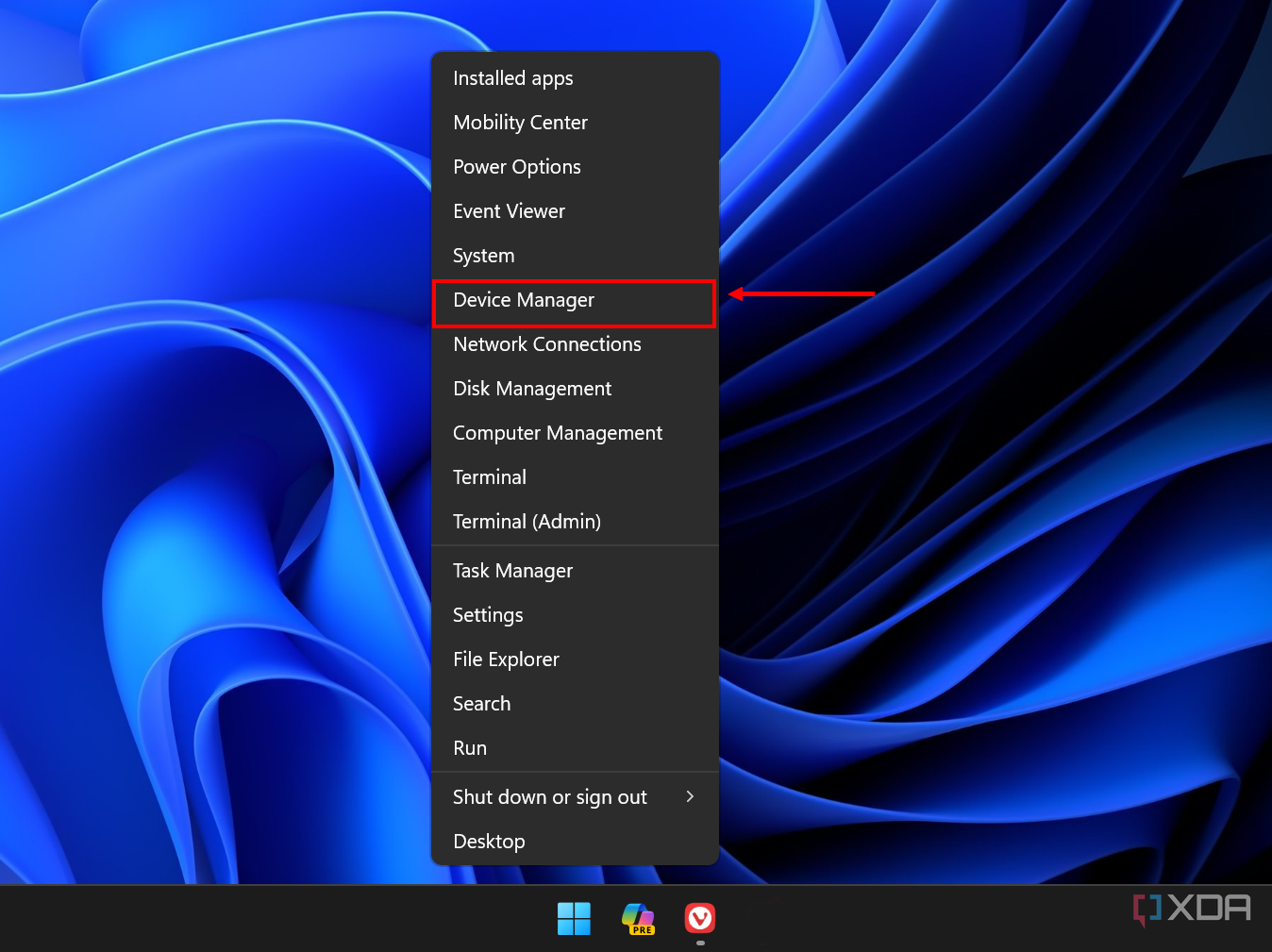 Screenshot of a Windows 11 desktop showing the Start menu context menu with the Device Manager option highlighted