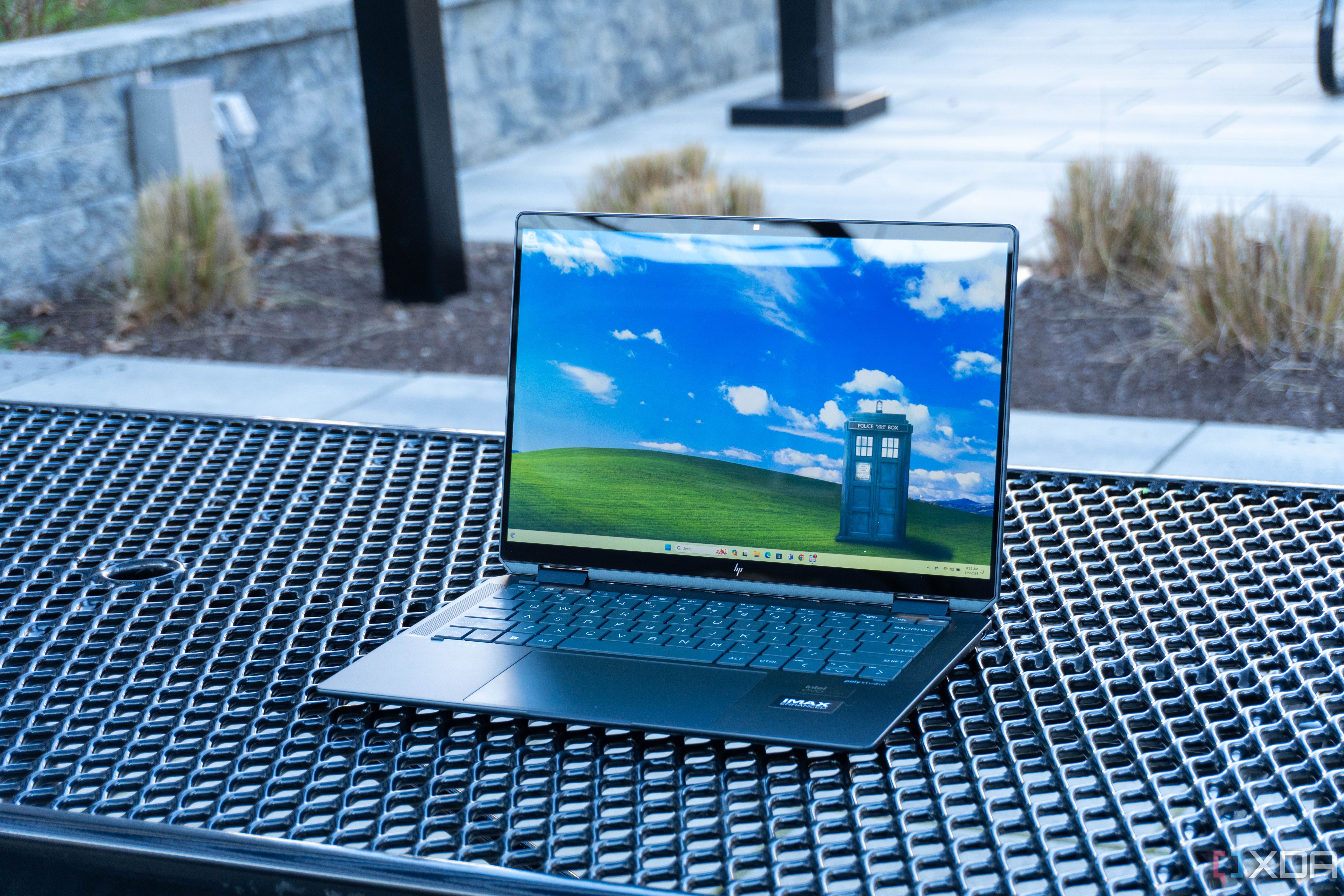 Angled view of the HP Spectre x360 14 on a metal table