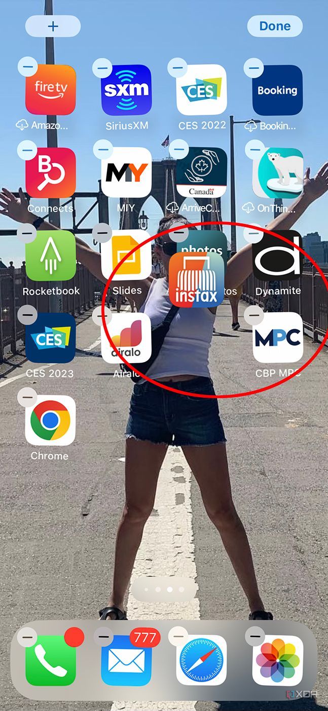an app being held over other apps in jiggle mode
