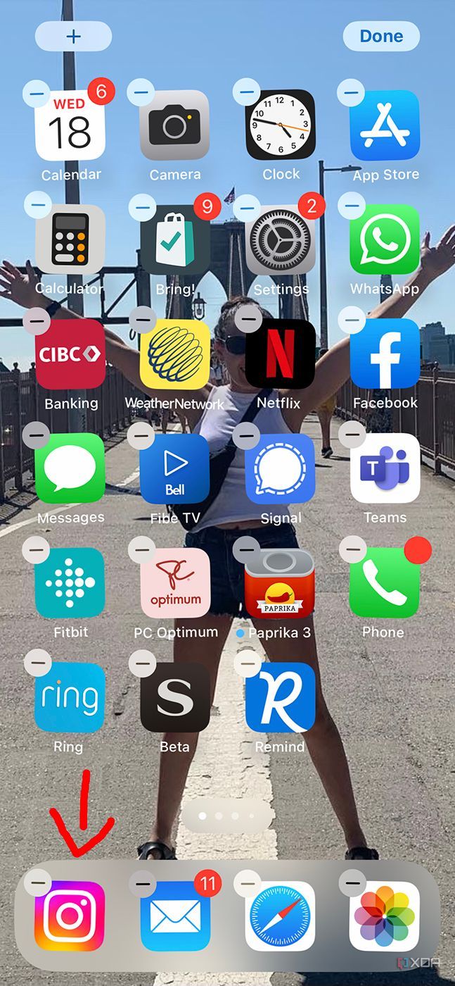 arrow pointing at app that was dragged from home screen to dock 