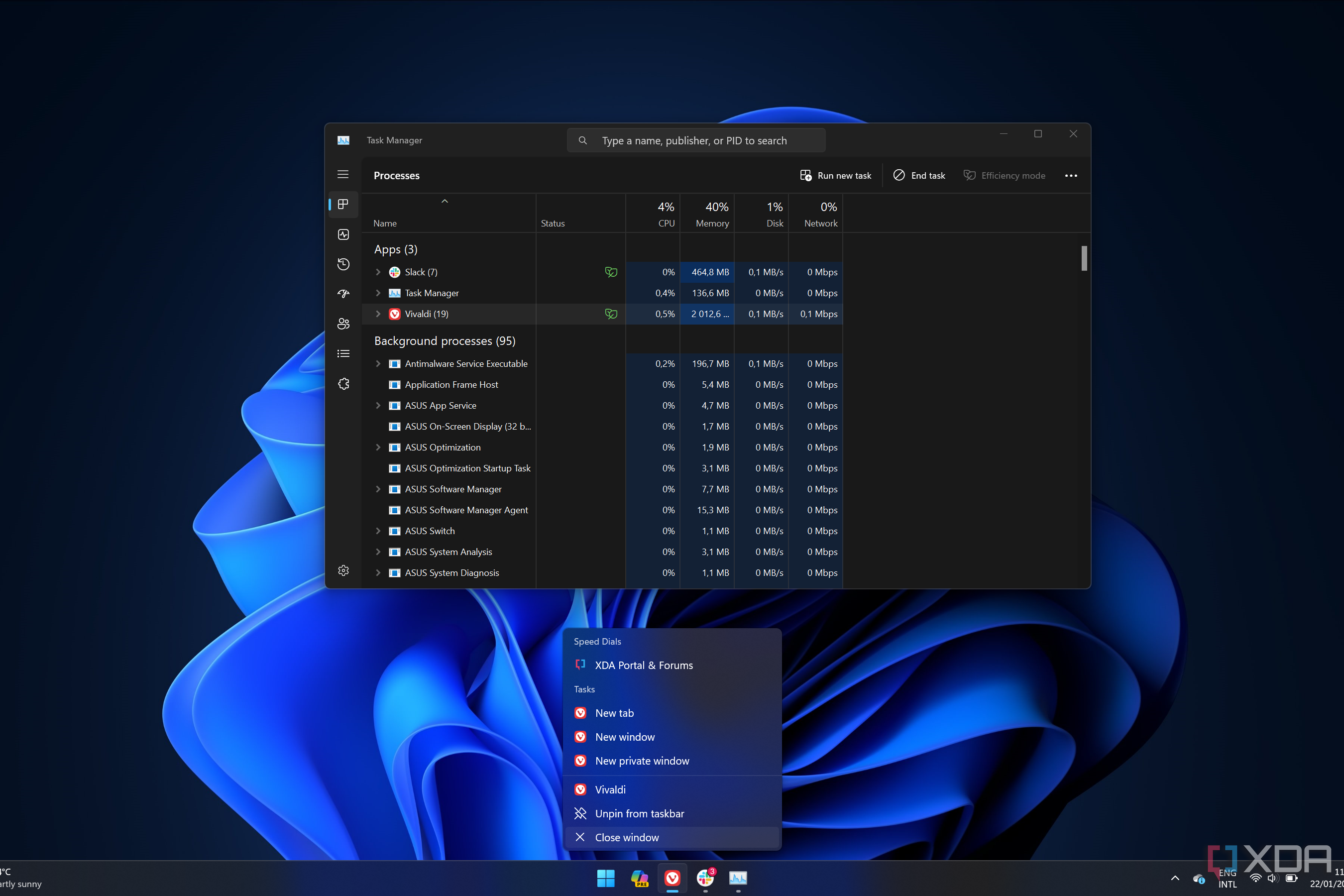 Screenshot of a Windows 11 desktop with Task Manager app and a jump list open with options to close an app