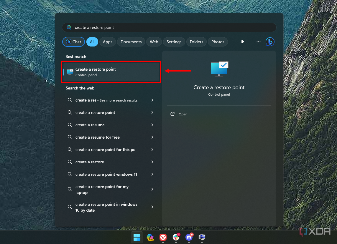 Screenshot of Windows 11 Search showing results for create a restore point