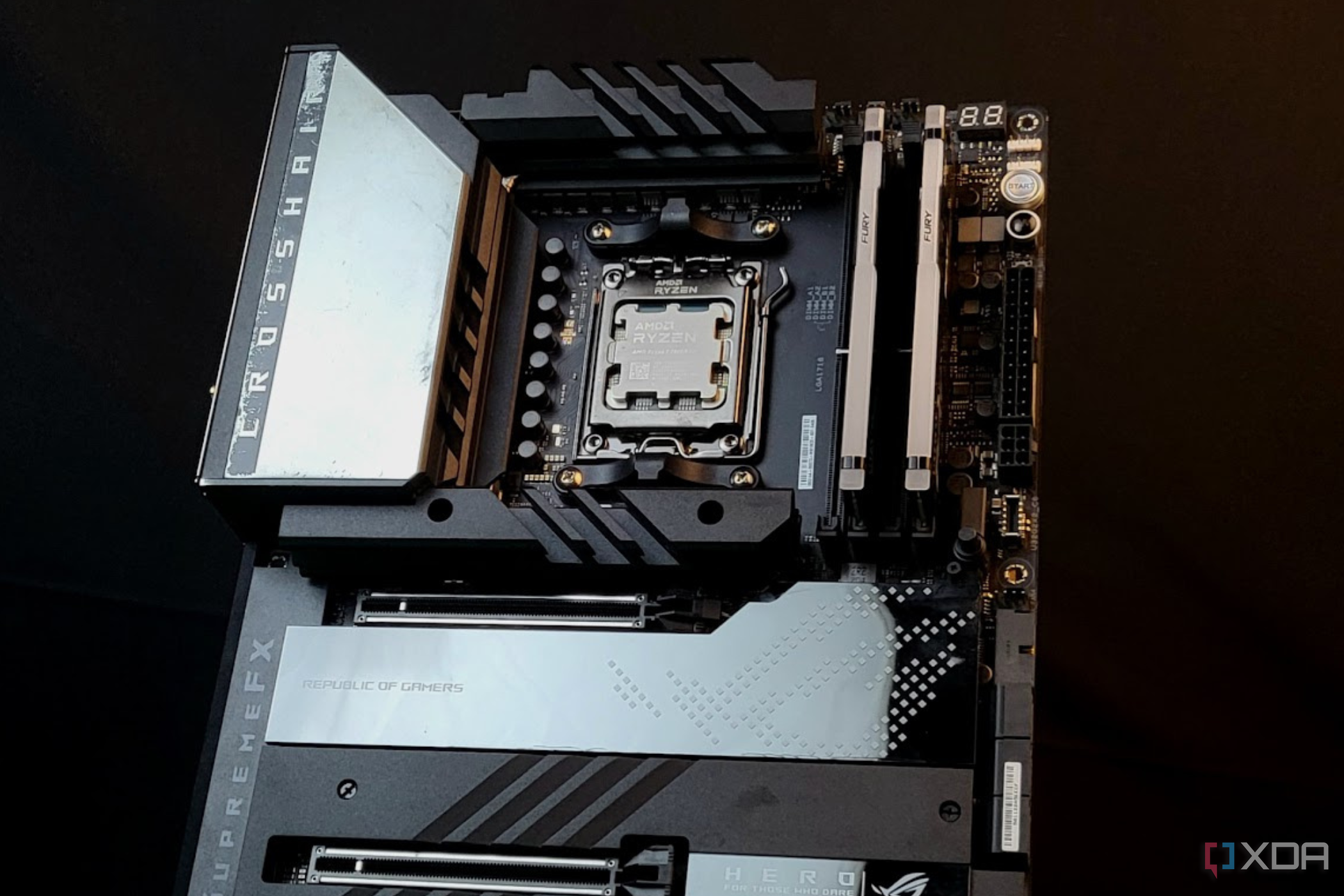 AMD Ryzen 7800X3D installed on an ASUS ROG Crosshair X670 E Extreme Motherboard captured on a black background