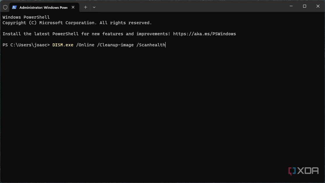 Screenshot of Windows Terminal with the DISM command to verify the health of the operating system