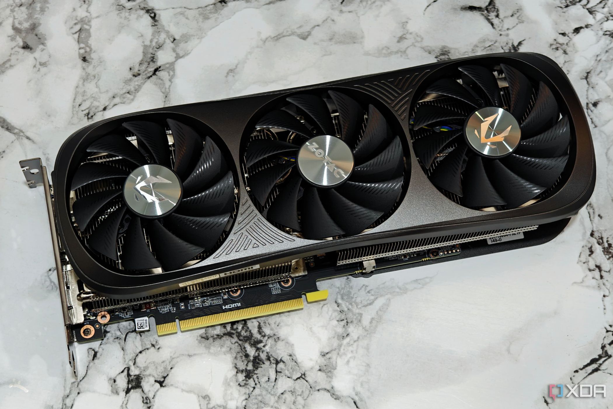 An image showing the Zotac Gaming GeForce RTX 4070 Super GPU kept on a table.