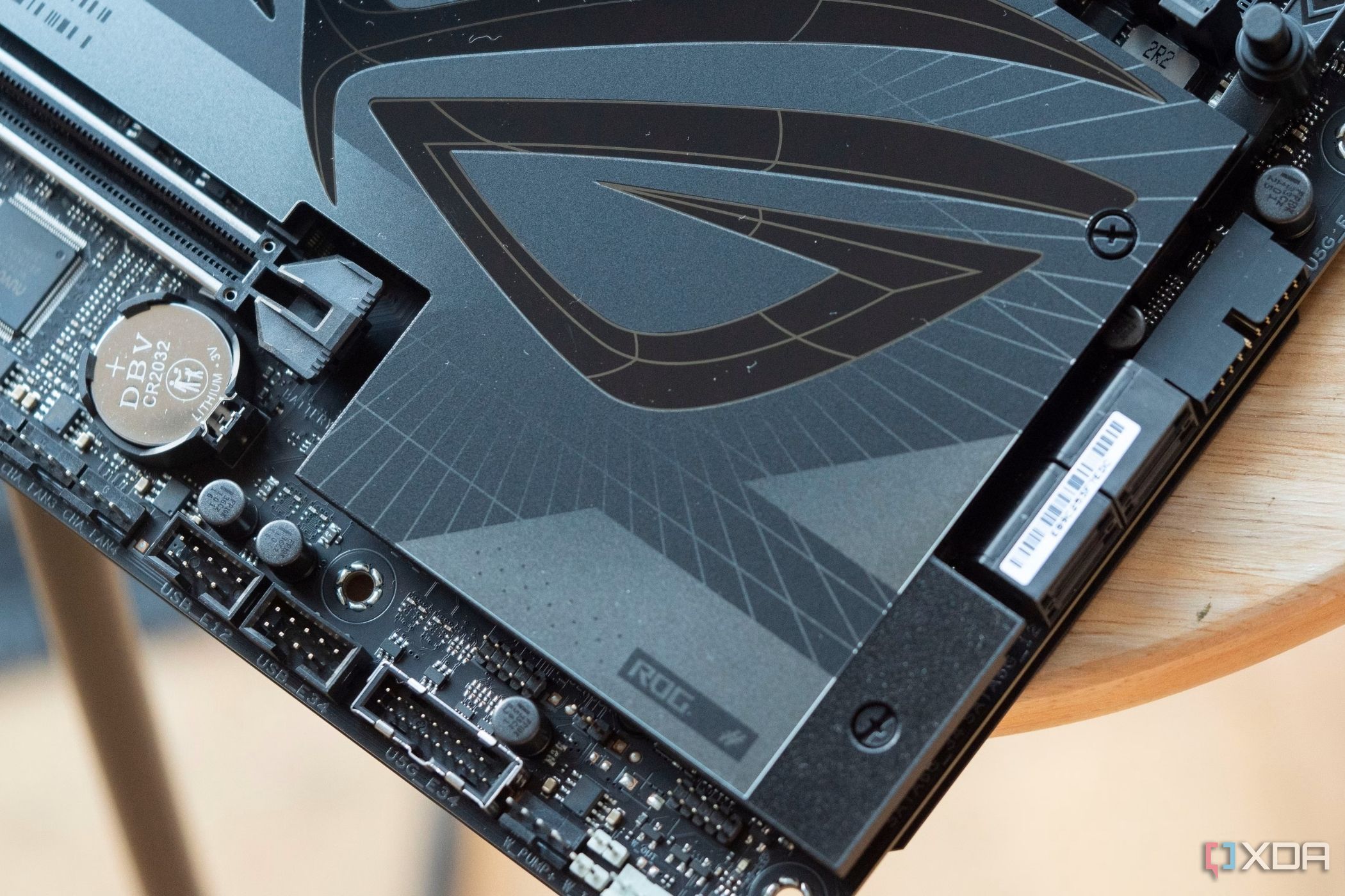 An image showing the ROG branding on an ASUS ROG gaming motherboard.