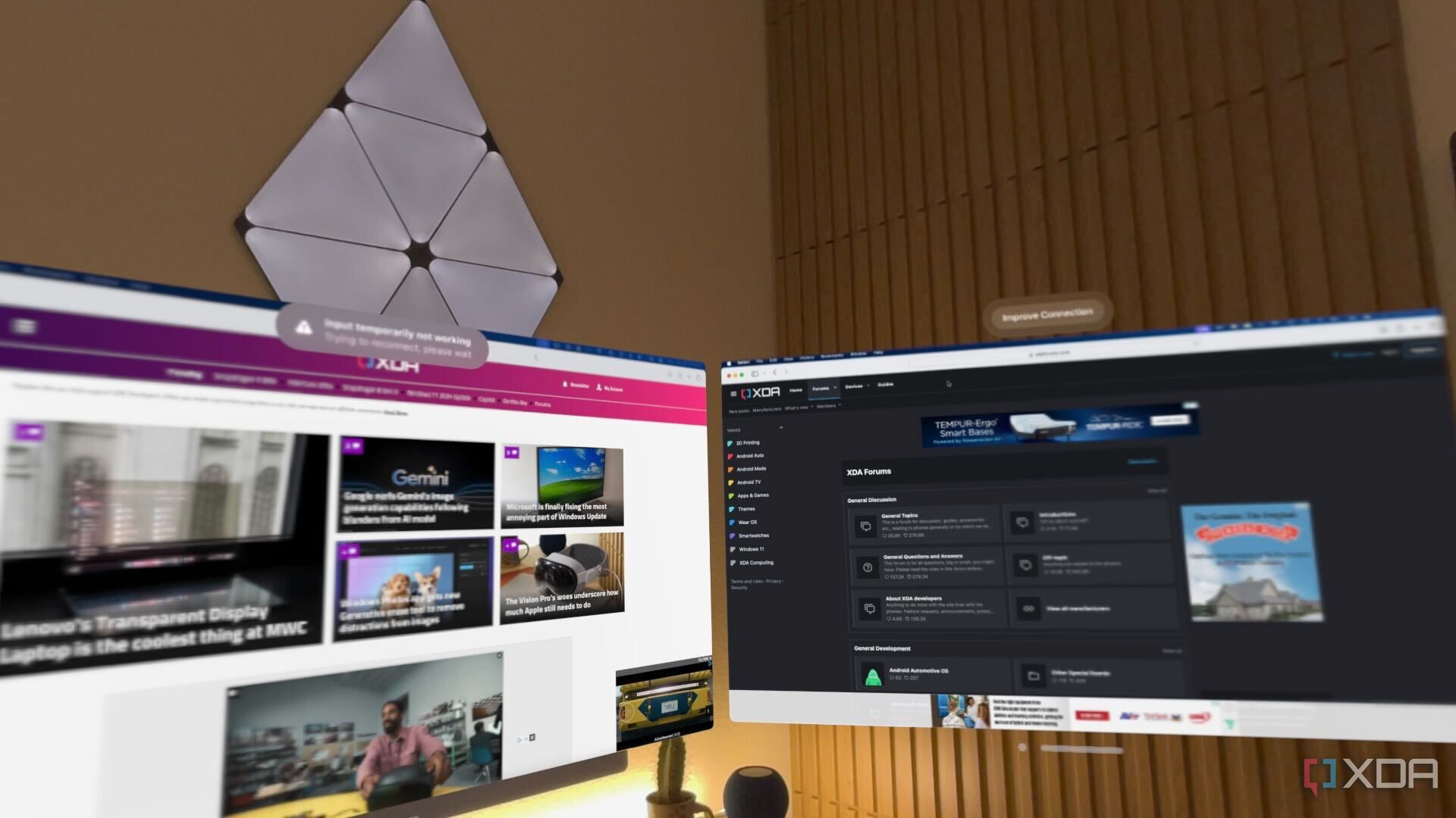The XDA Portal and Forums opened on dual Mac windows in Vision Pro. 