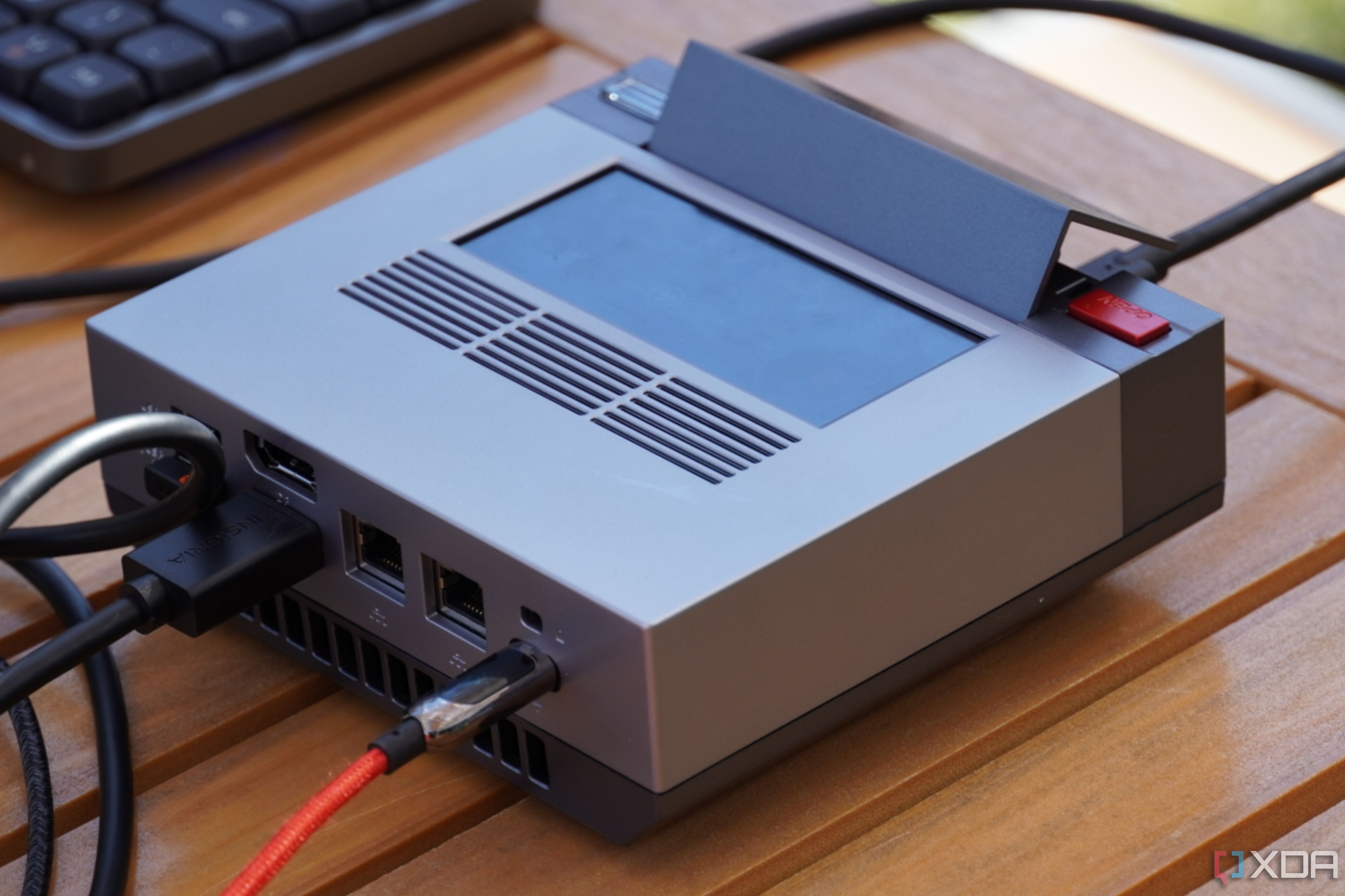 The Ayaneo Mini PC AM02 with cables connected.