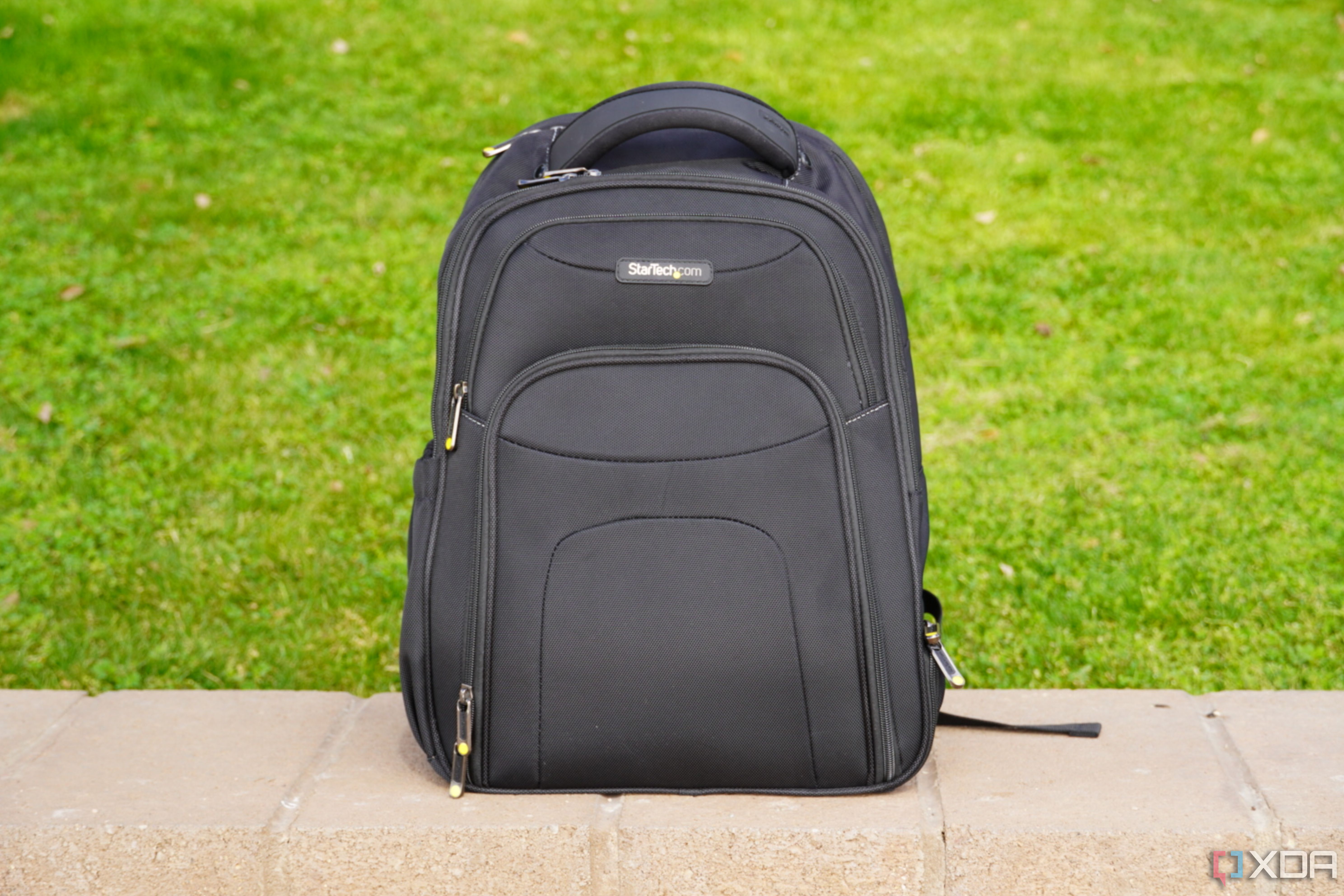 The Startech Laptop Backpack on a bench.