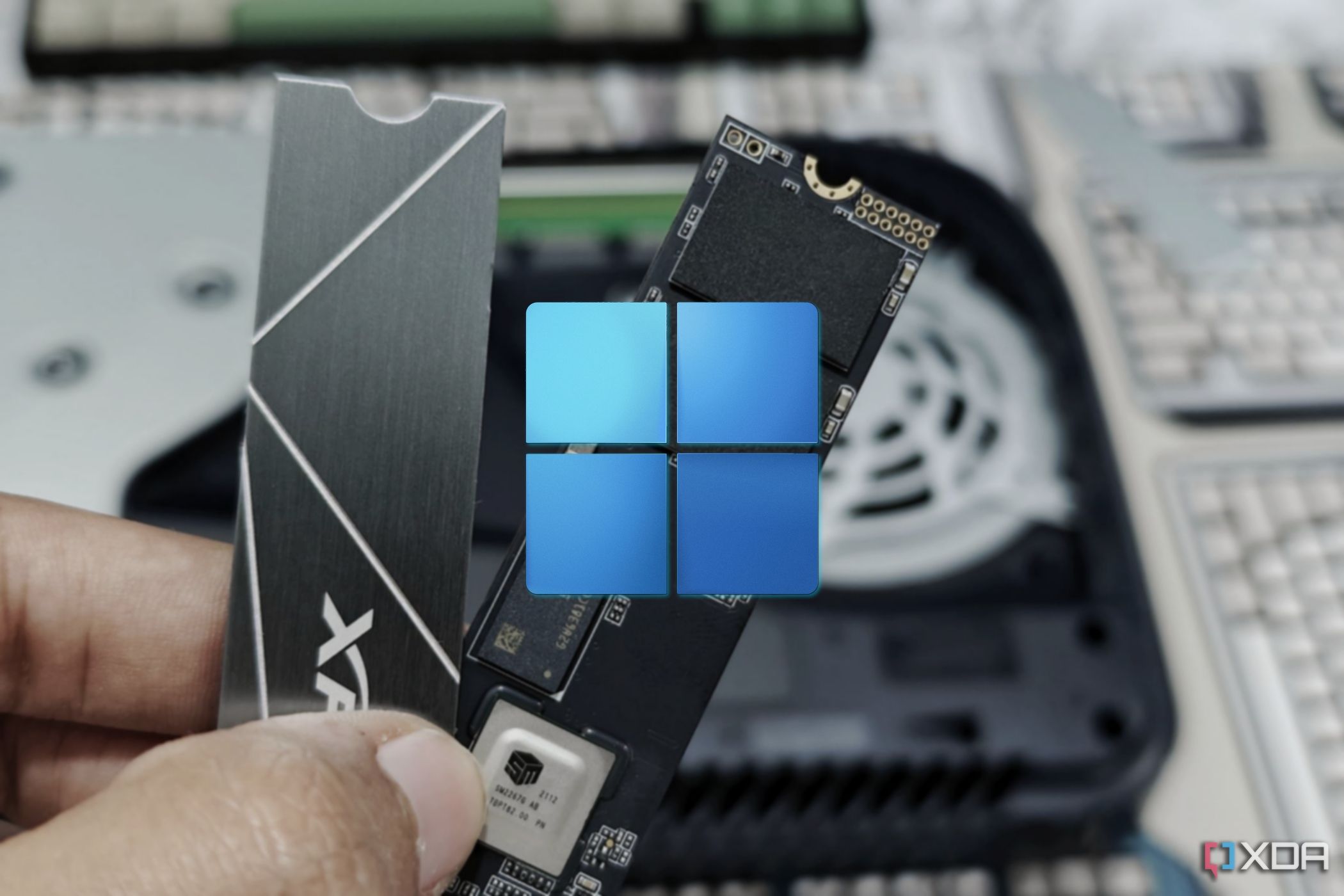 An M.2 SSD with a Windows 11 logo over it