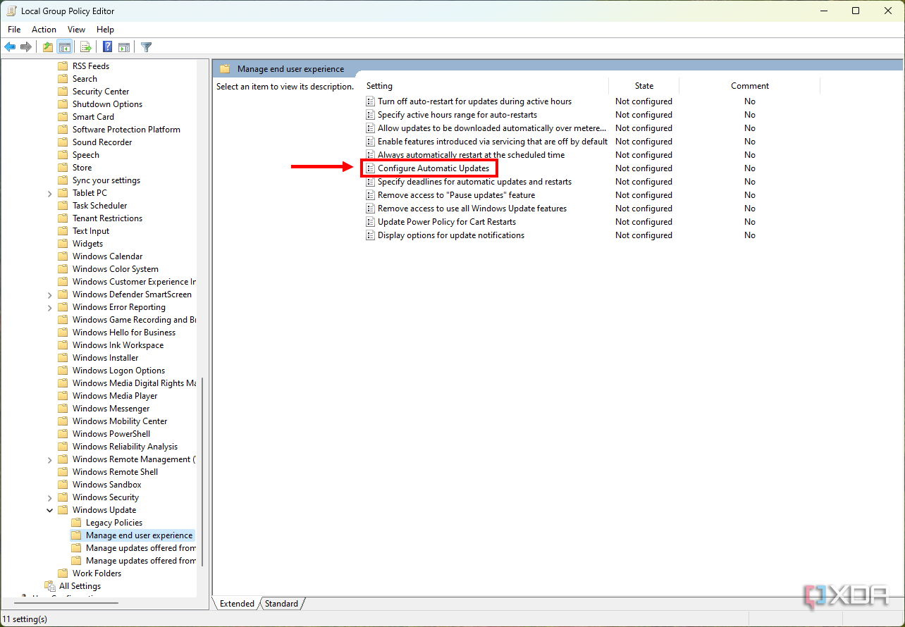 Screenshot of the Group Policy Editor showing the Configure Automatic Updates option for Windows Update
