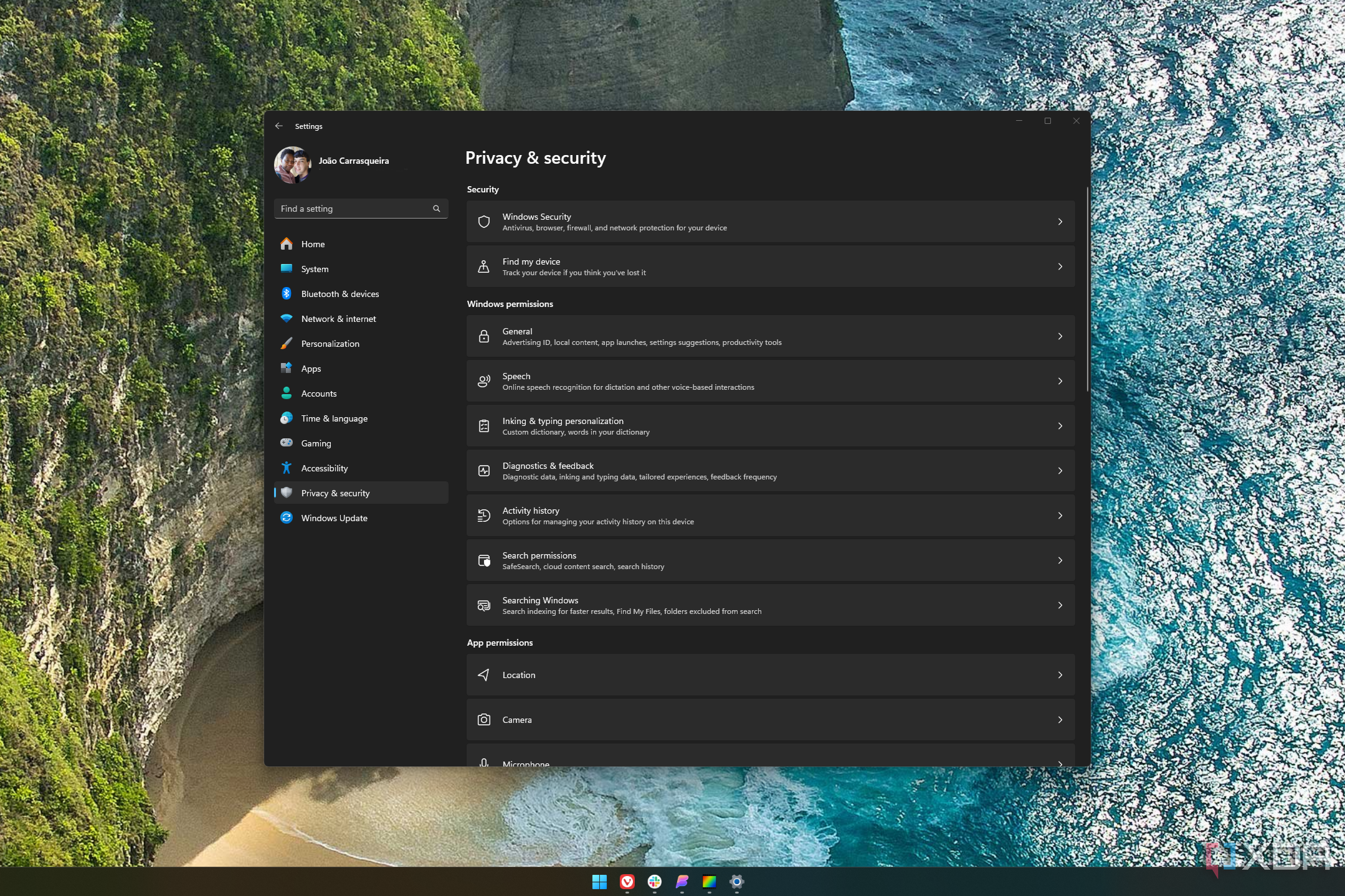 Screenshot of a Windows 11 desktop with privacy and security settings open